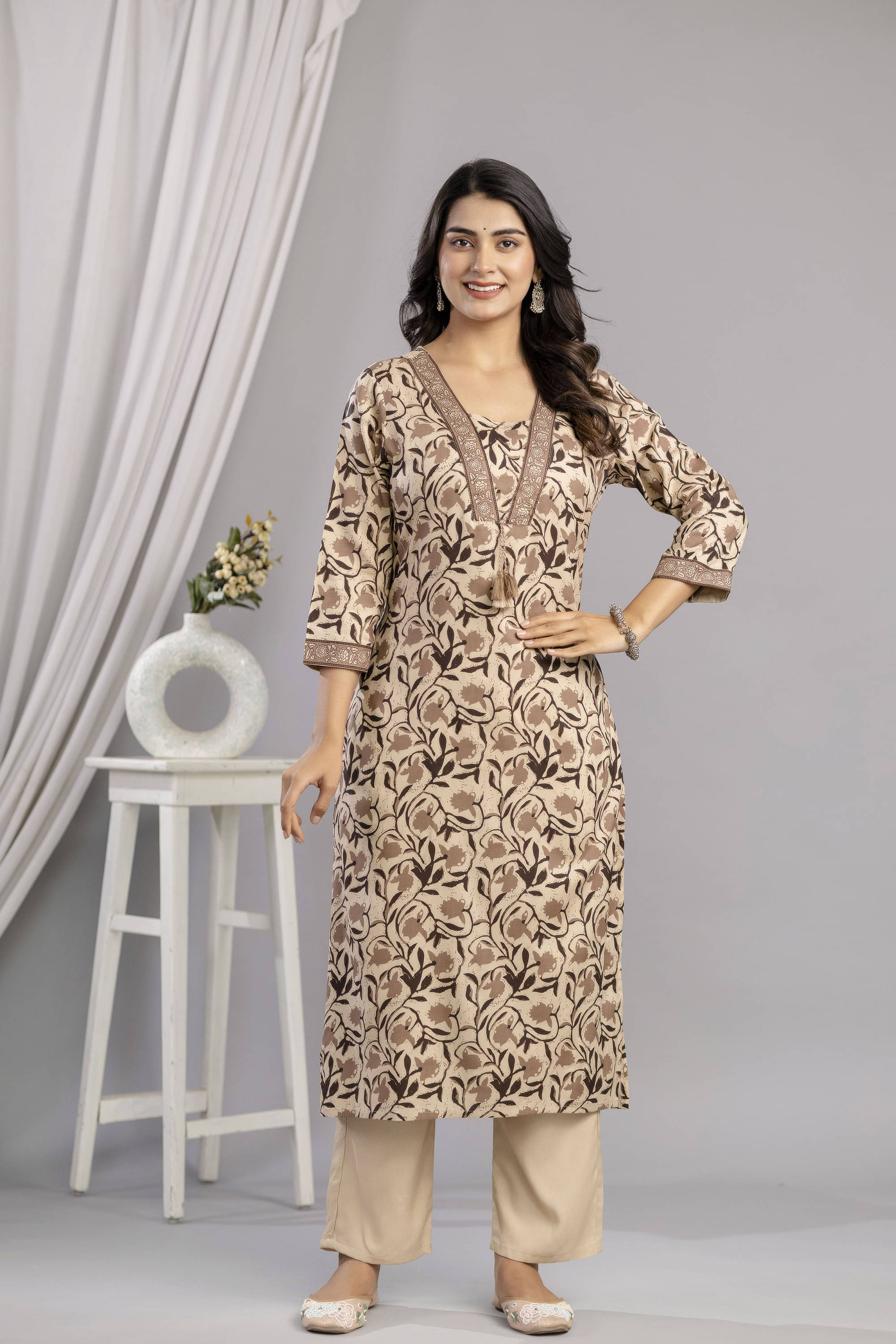 VESHVITI Women Viscose Rayon Embroidered Straight Kurti ( Brown ) VESHVITI Women Viscose Rayon Embroidered Straight Kurti ( Brown )