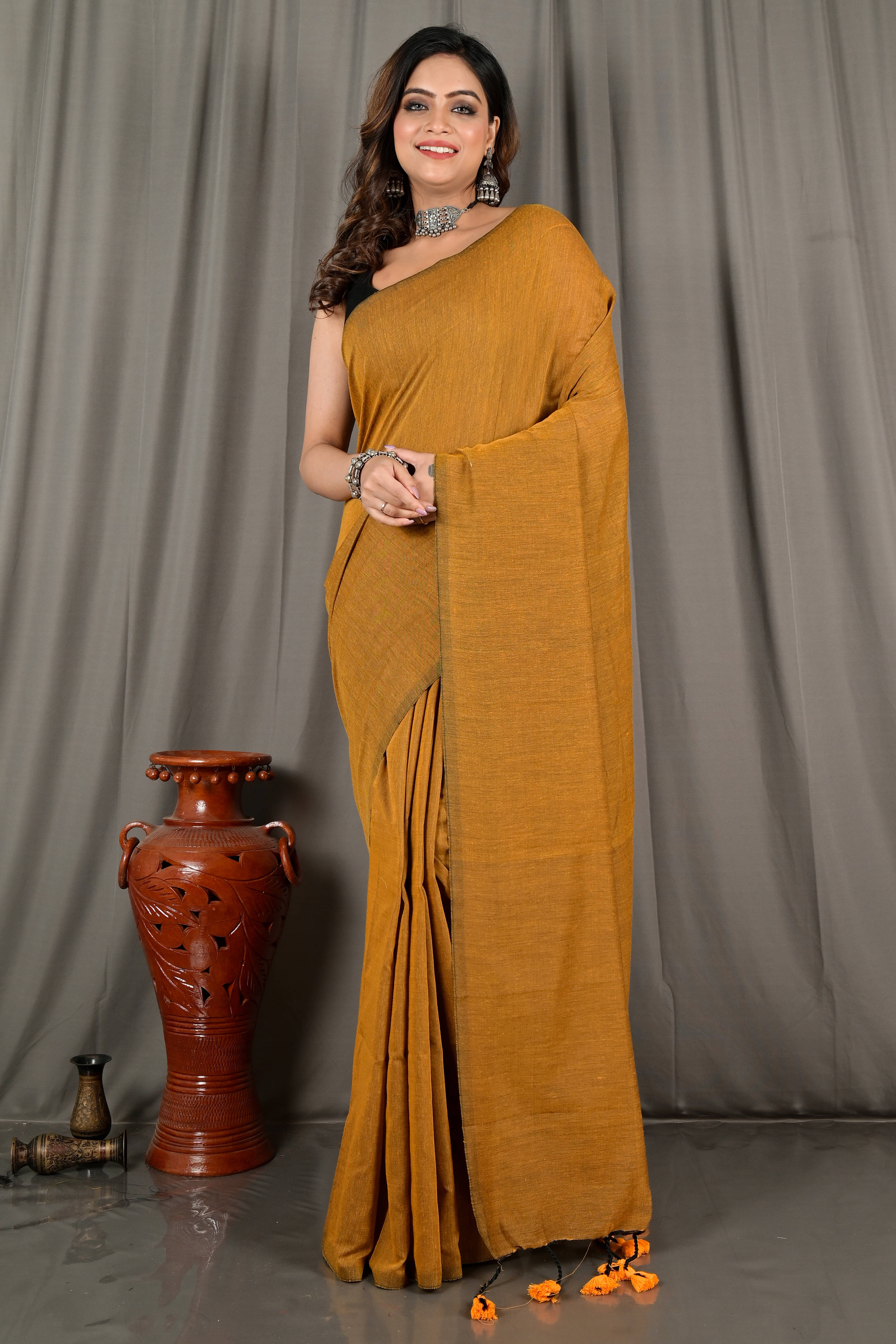 BRYNBRIT Cotton Self Design Saree With Unstitched Blouse Piece ( Mustard ) BRYNBRIT Cotton Self Design Saree With Unstitched Blouse Piece ( Mustard )