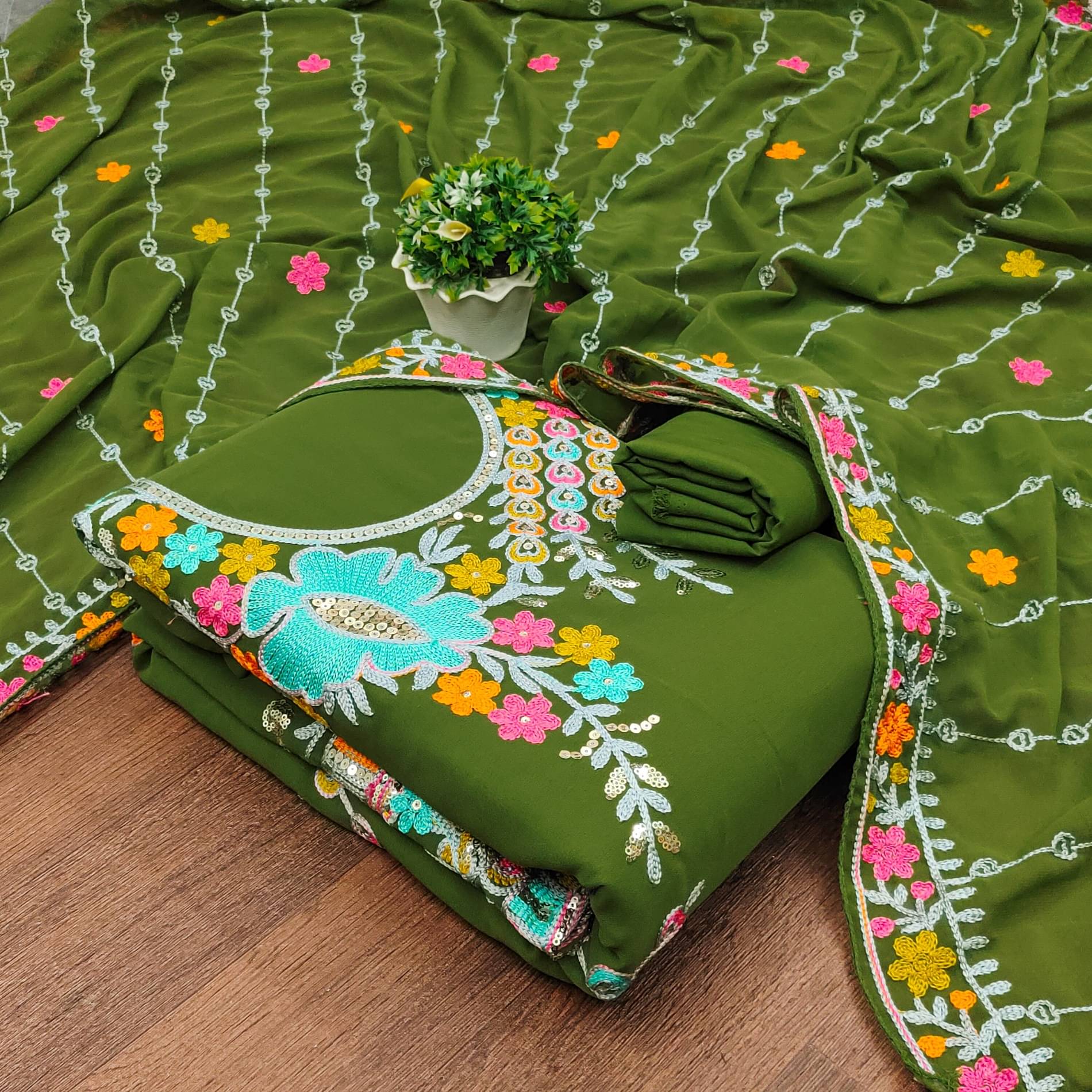     			Rangtulika Ethnics Women Georgette Unstitched Dress Material ( Light Green )