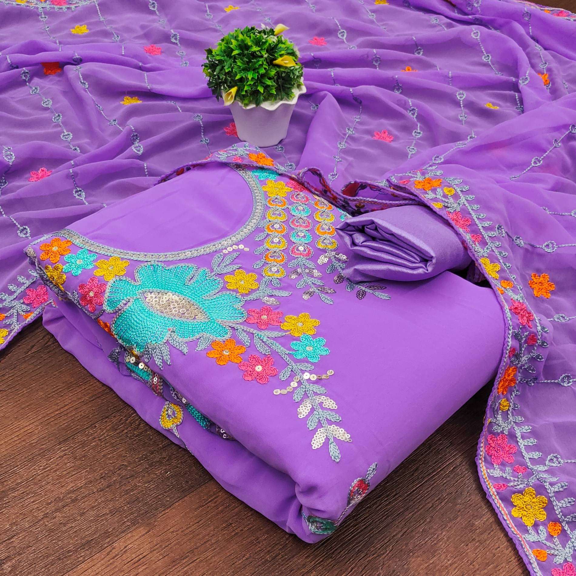 Rangtulika Ethnics Women Georgette Unstitched Dress Material ( Purple ) Rangtulika Ethnics Women Georgette Unstitched Dress Material ( Purple )