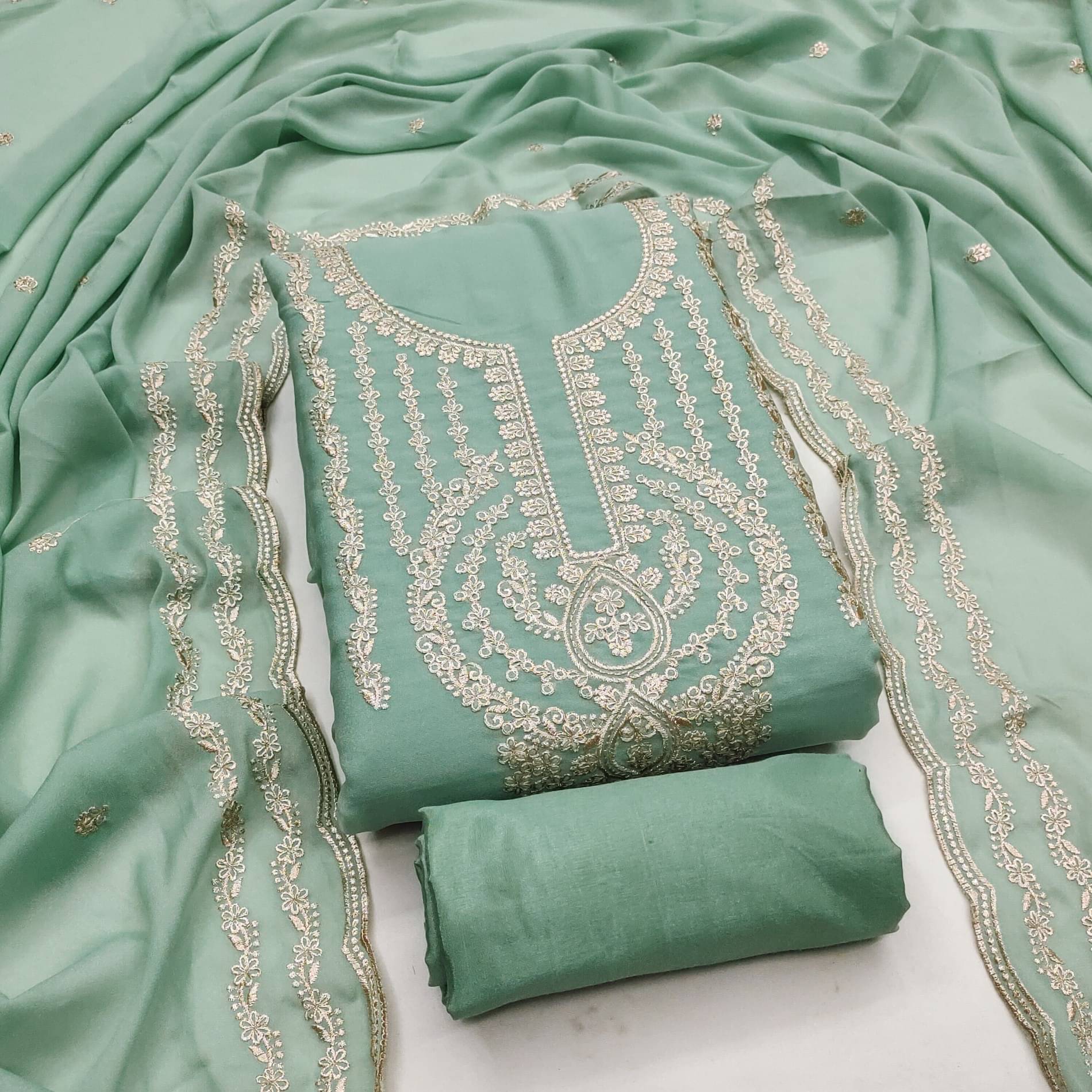 Rangtulika Ethnics Women Cotton Unstitched Dress Material ( Teal ) Rangtulika Ethnics Women Cotton Unstitched Dress Material ( Teal )