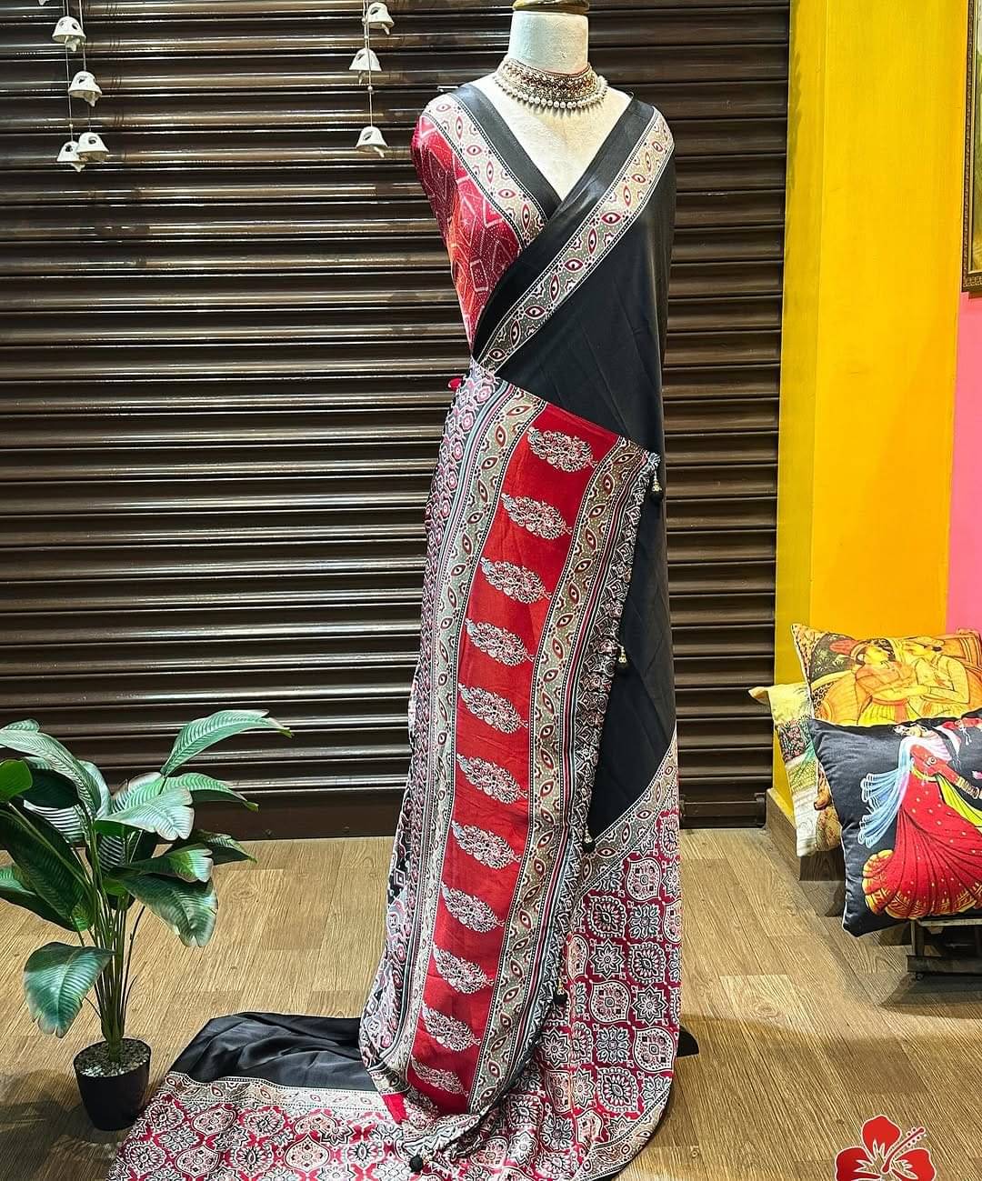SHIRODHARI Satin Printed Sambalpuri Saree With Unstitched Blouse Piece ( Black ) SHIRODHARI Satin Printed Sambalpuri Saree With Unstitched Blouse Piece ( Black )
