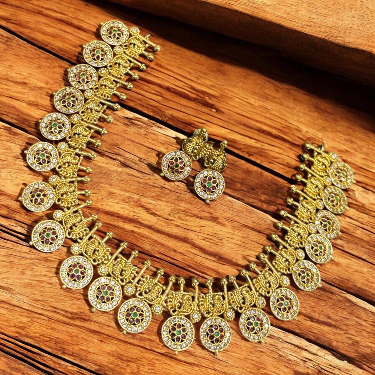     			charming luxe jewel Golden Brass Necklace Set ( Pack of 1 )