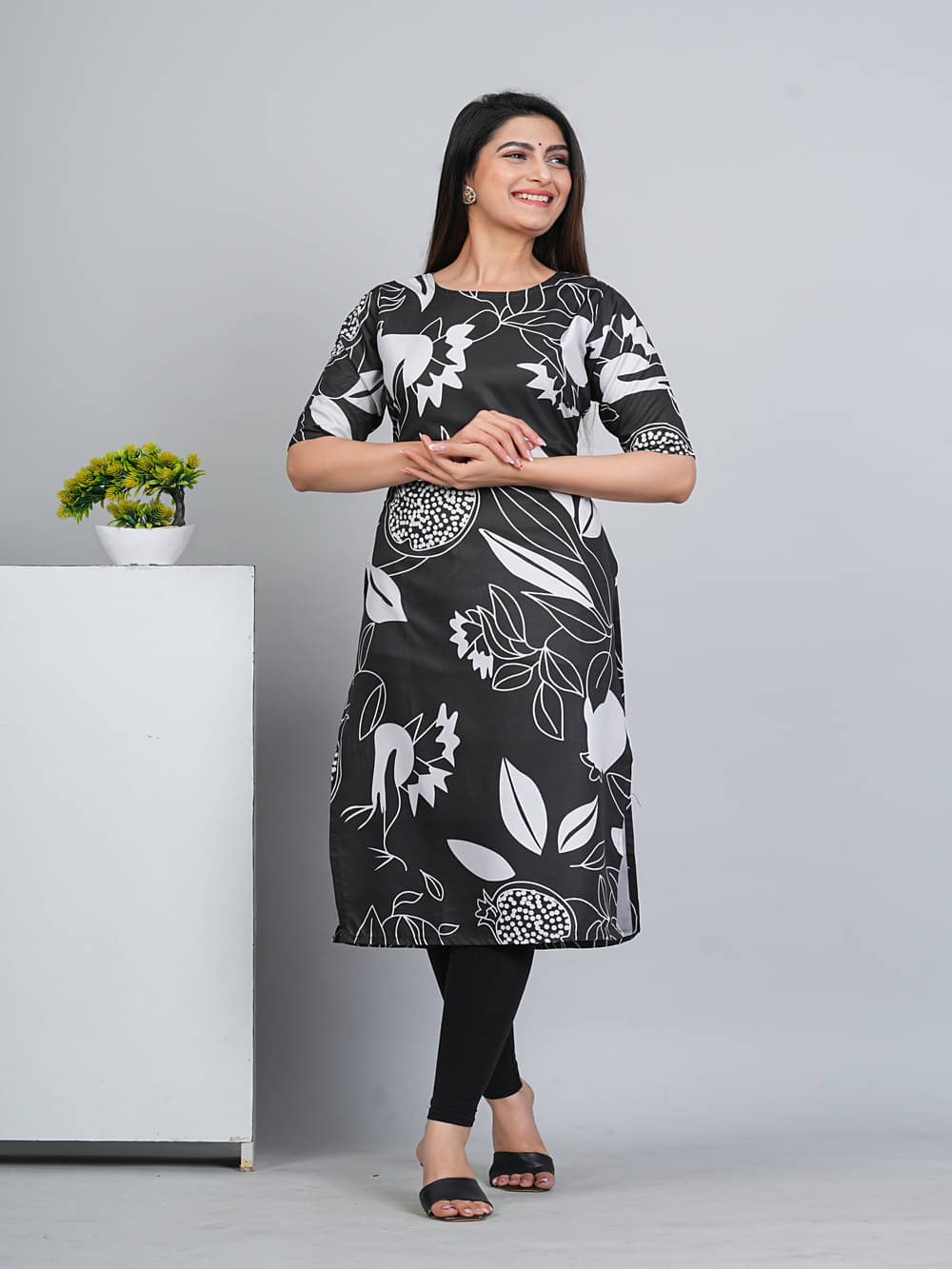 RIAANA Women Crepe Printed A-line Kurti ( Black ) RIAANA Women Crepe Printed A-line Kurti ( Black )