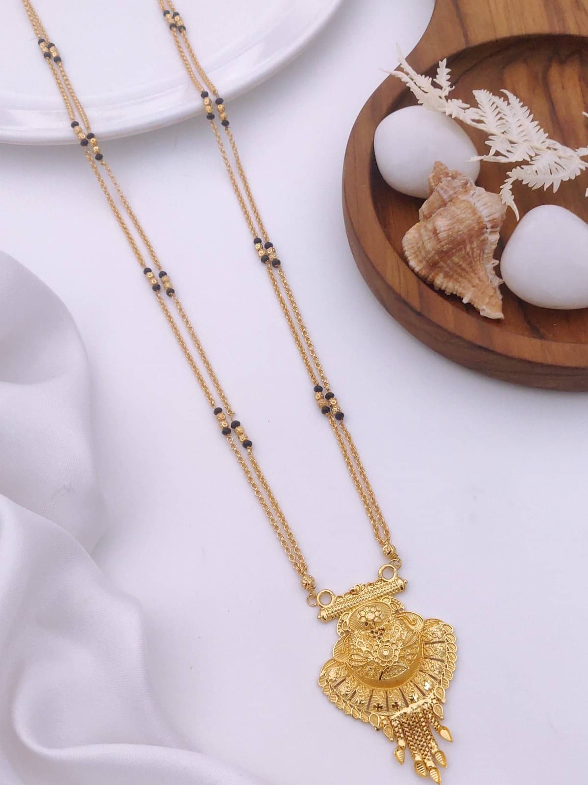 TKRB SALES Golden Mangalsutra ( Pack of 1 ) TKRB SALES Golden Mangalsutra ( Pack of 1 )