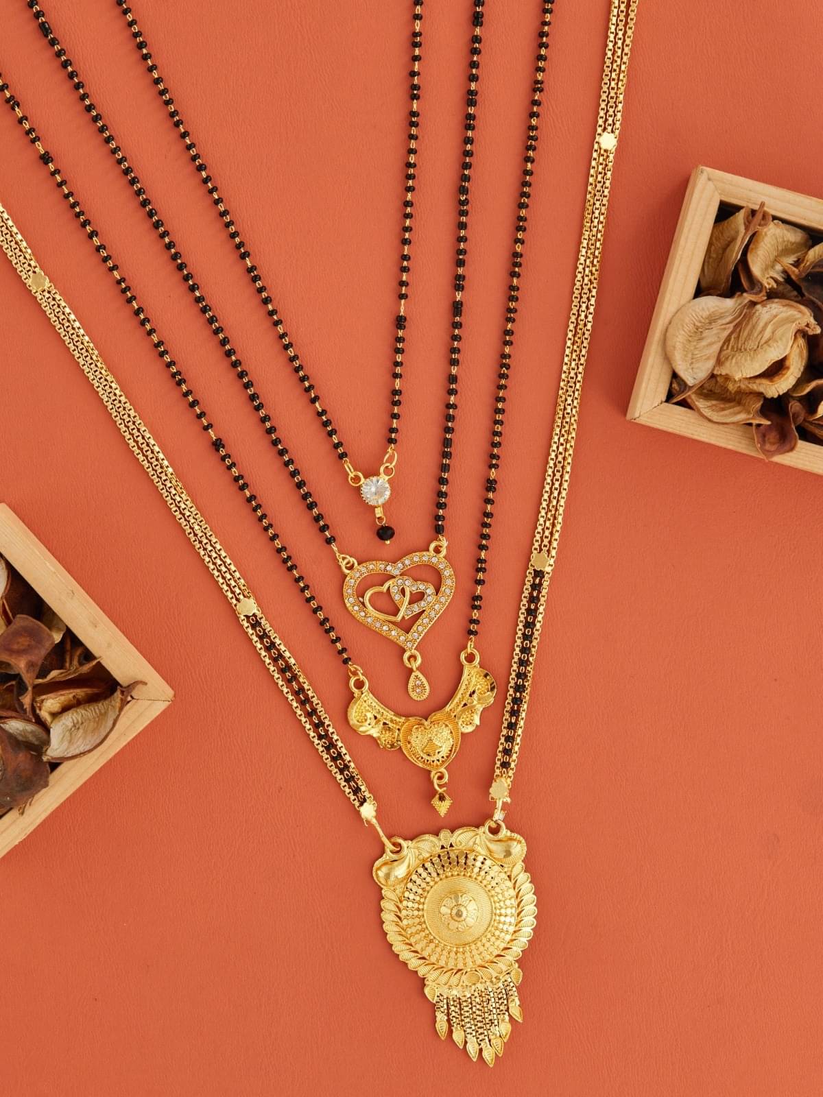 TKRB SALES Golden Mangalsutra ( Pack of 1 )     			TKRB SALES Golden Mangalsutra ( Pack of 1 )