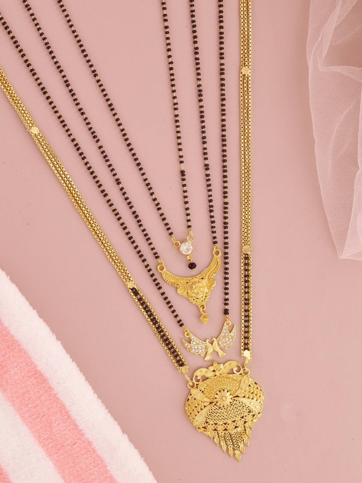 TKRB SALES Golden Mangalsutra ( Pack of 1 )     			TKRB SALES Golden Mangalsutra ( Pack of 1 )