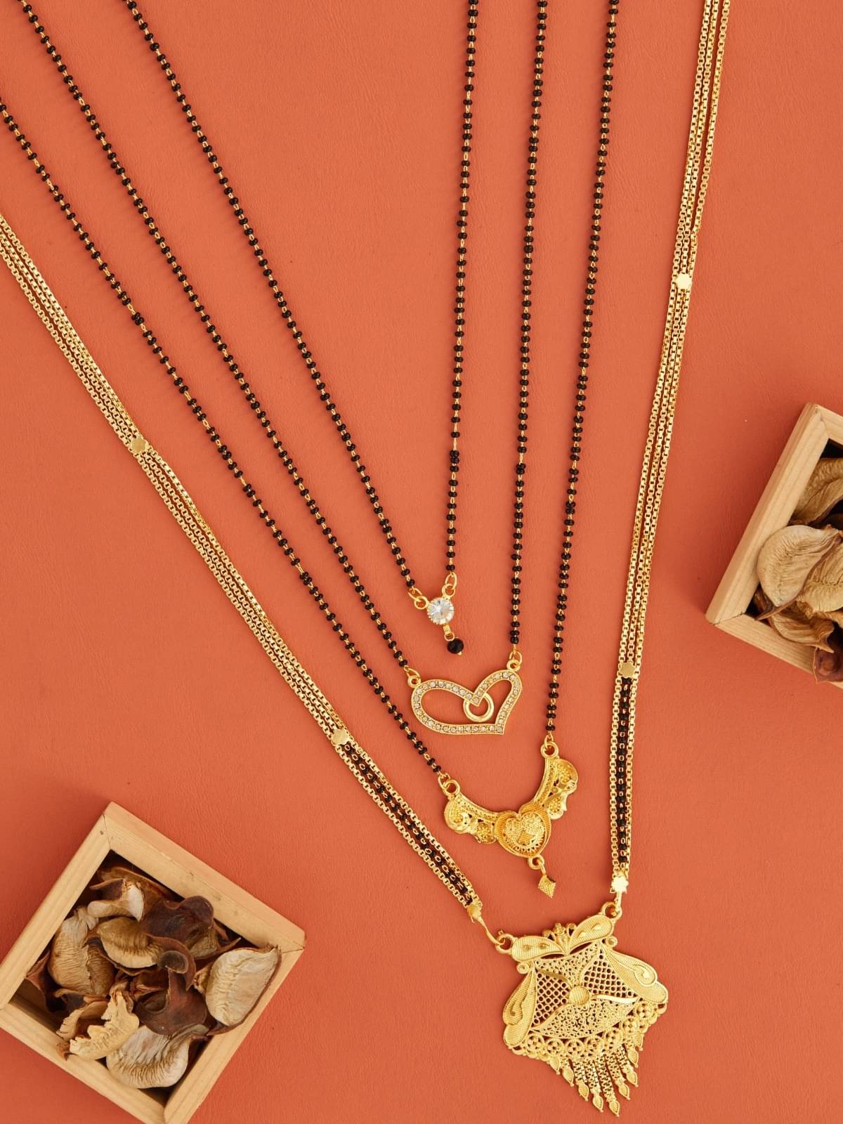 TKRB SALES Golden Mangalsutra ( Pack of 1 )     			TKRB SALES Golden Mangalsutra ( Pack of 1 )