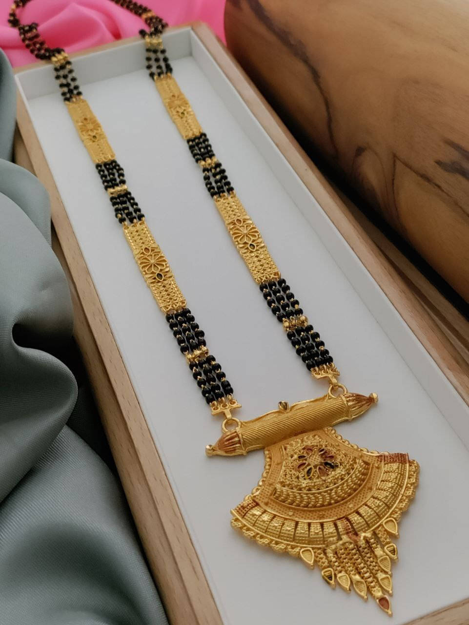TKRB SALES Golden Mangalsutra ( Pack of 1 )     			TKRB SALES Golden Mangalsutra ( Pack of 1 )