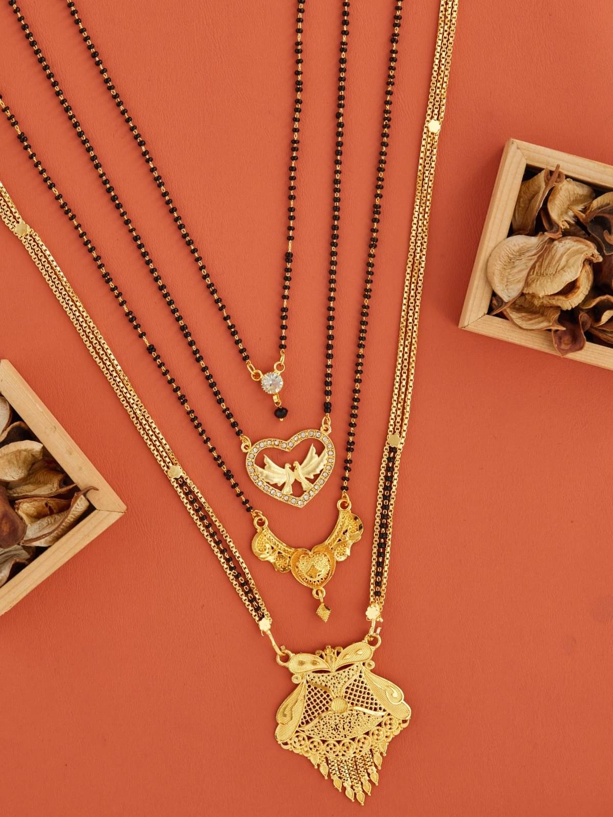 TKRB SALES Golden Mangalsutra ( Pack of 1 )     			TKRB SALES Golden Mangalsutra ( Pack of 1 )