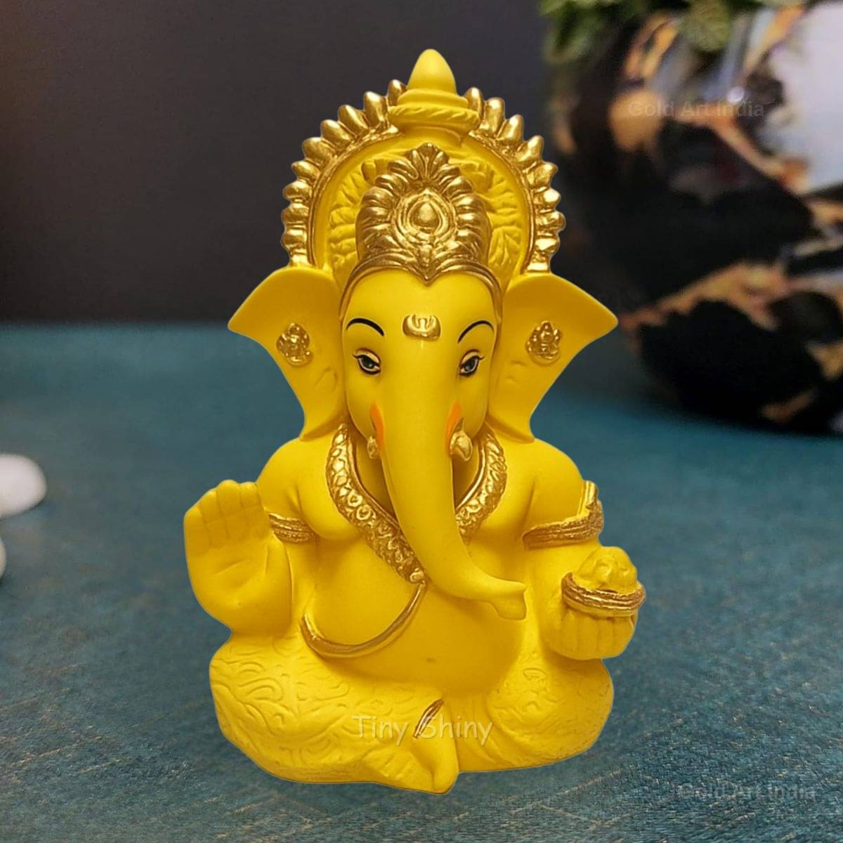    			Tiny Shiny Resin Lord Ganesha Idol ( 9 cm )