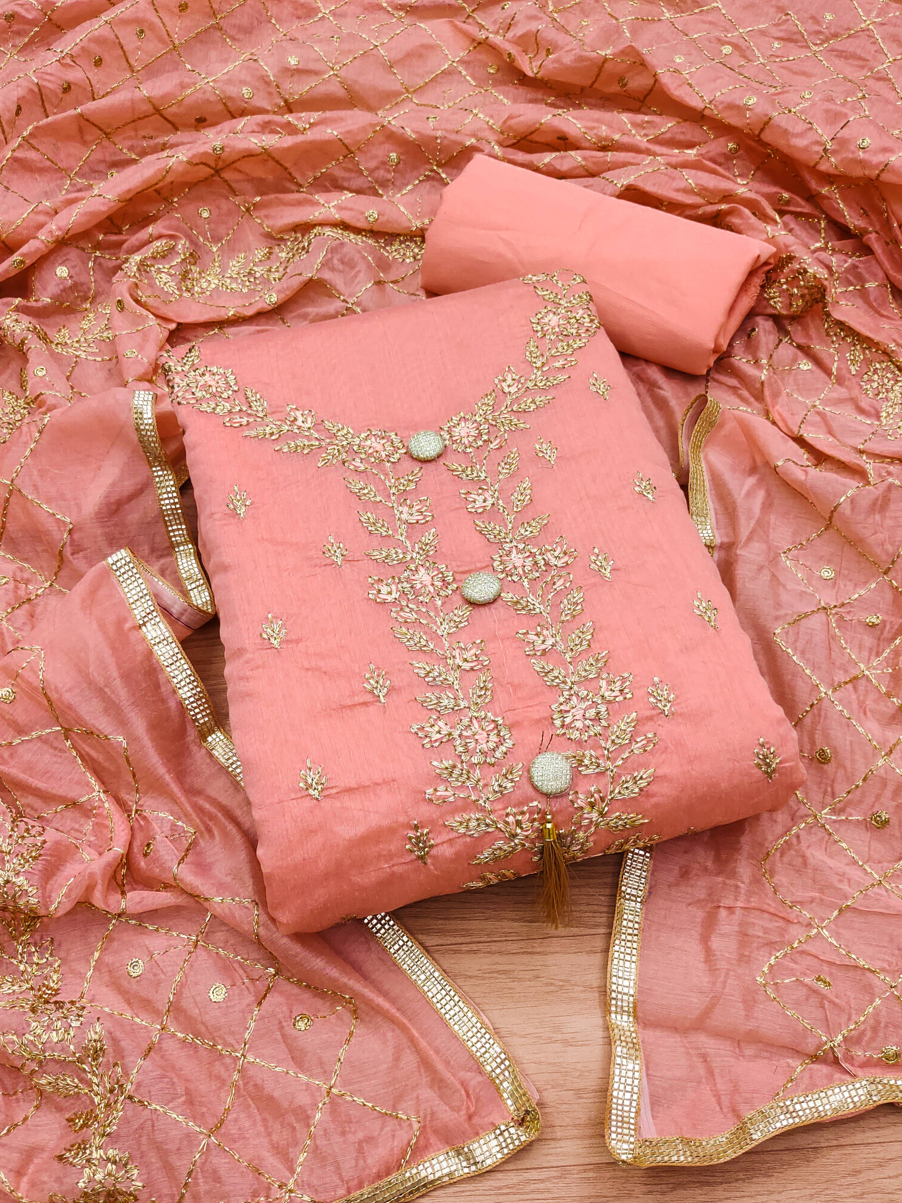 Nayanthara Trends Women Chanderi Unstitched Dress Material ( Peach ) Nayanthara Trends Women Chanderi Unstitched Dress Material ( Peach )
