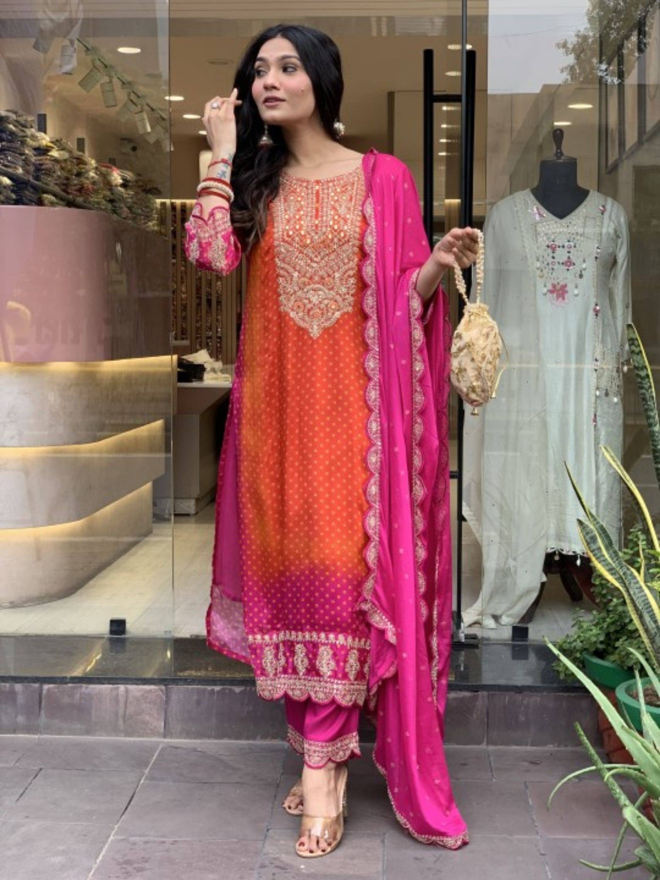     			Niza Fashion Women Silk Embroidered Straight Kurti With Pants ( Orange )