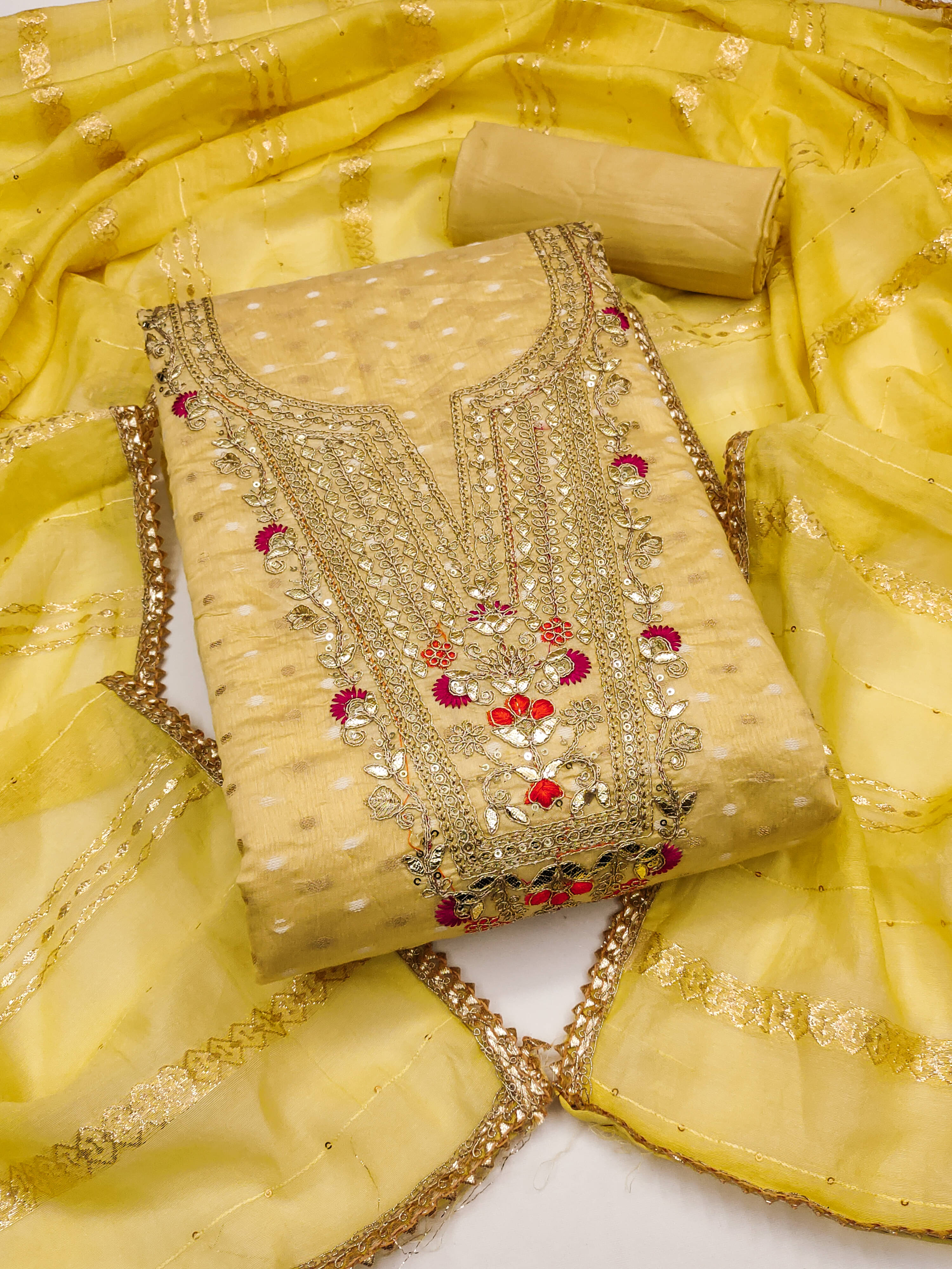 Nayanthara Trends Women Chanderi Unstitched Dress Material ( Yellow ) Nayanthara Trends Women Chanderi Unstitched Dress Material ( Yellow )