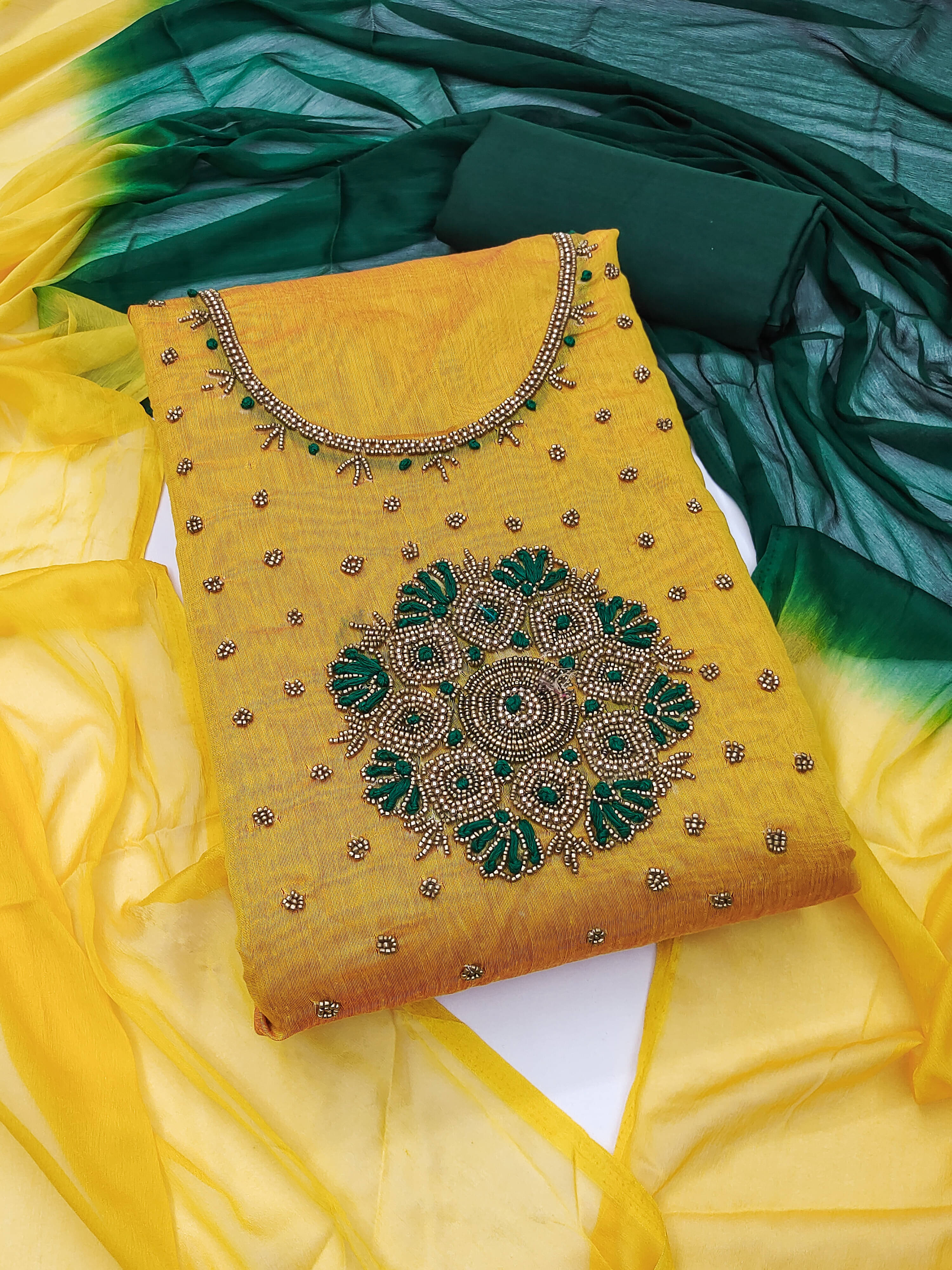 Nayanthara Trends Women Chanderi Unstitched Dress Material ( Yellow ) Nayanthara Trends Women Chanderi Unstitched Dress Material ( Yellow )