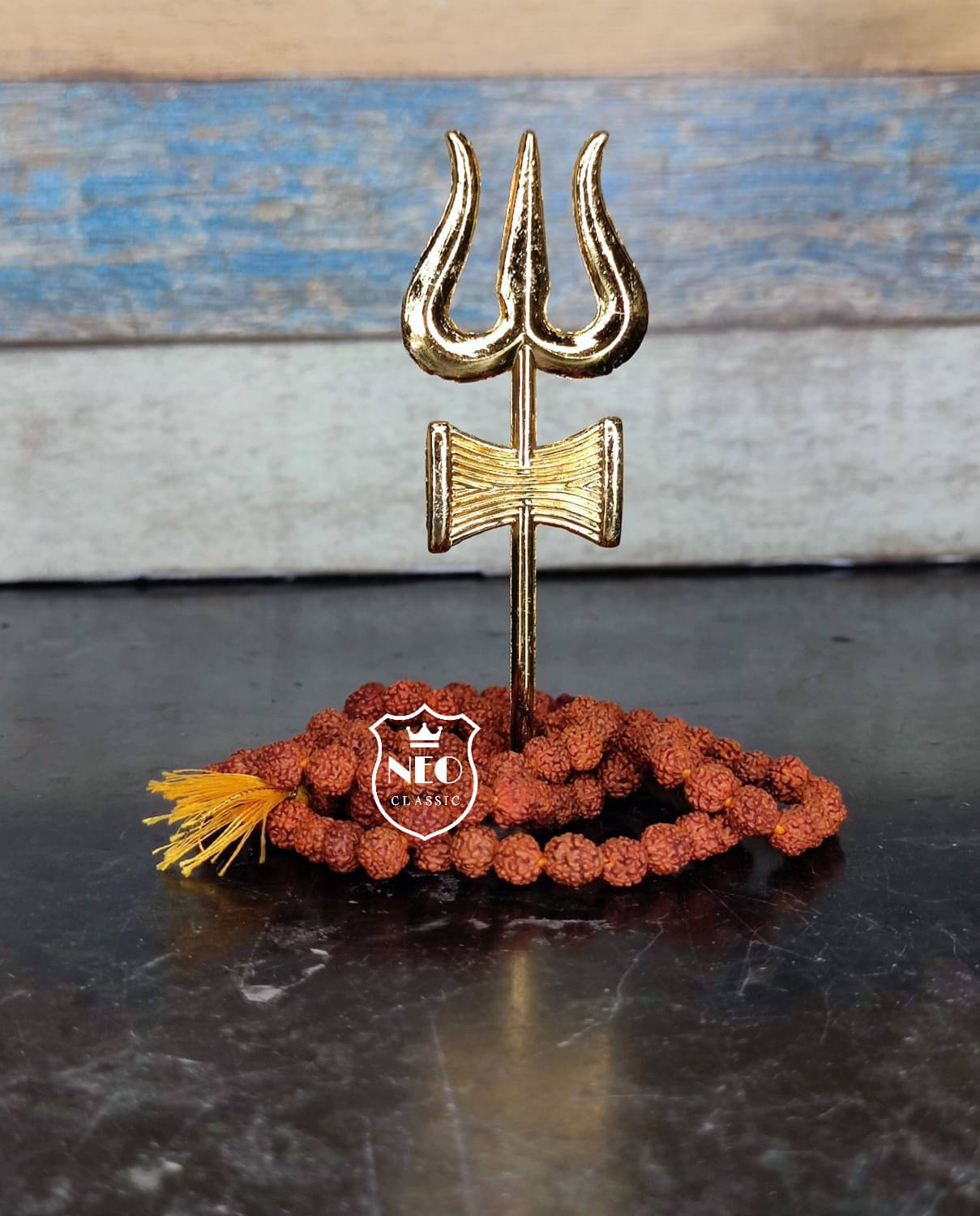 Neo Classic Rudraksha Mala Original 5 Face 108 Beads with Lord Shiva Trishul Decorative Showpiece - 10.5 cm (Aluminium, Wood, Gold) Neo Classic Rudraksha Mala Original 5 Face 108 Beads with Lord Shiva Trishul Decorative Showpiece - 10.5 cm (Aluminium, Wood, Gold)