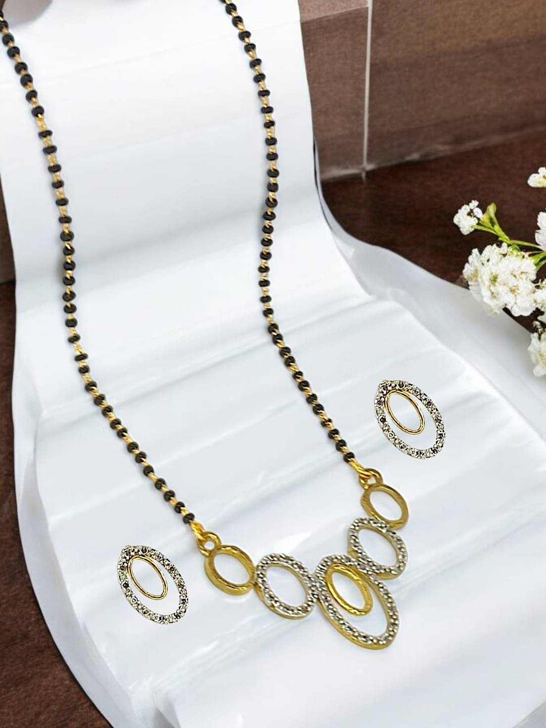 9blings Yellow Mangalsutra Set ( Pack of 1 ) 9blings Yellow Mangalsutra Set ( Pack of 1 )