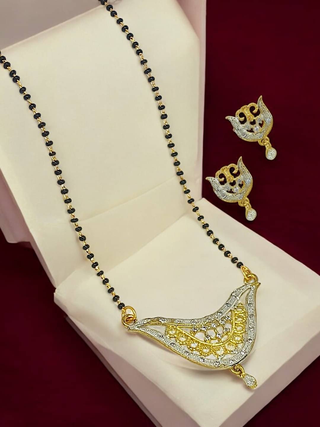 9blings Yellow Mangalsutra Set ( Pack of 1 ) 9blings Yellow Mangalsutra Set ( Pack of 1 )