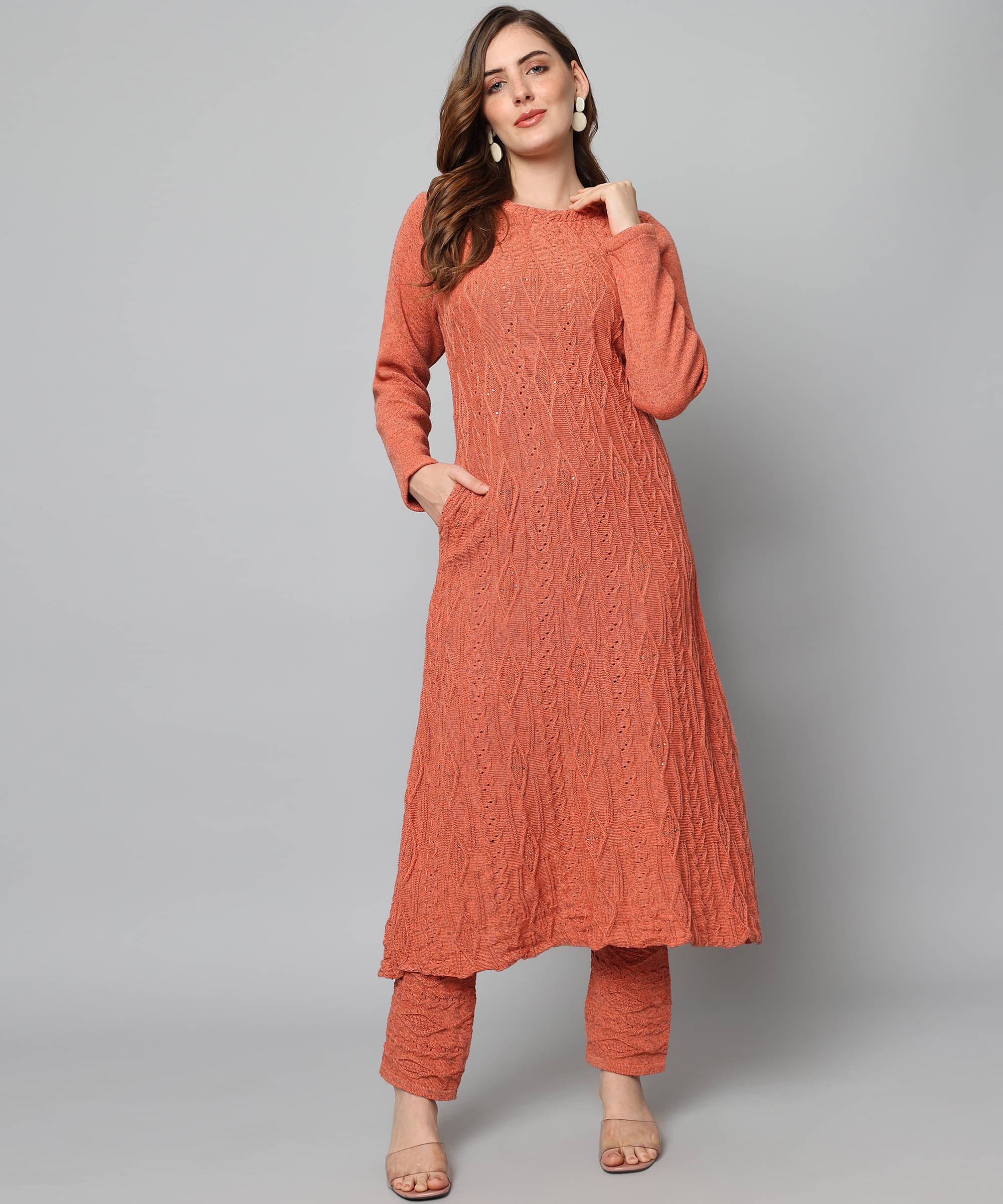 Canblar Women Woollen Solid Frock Style Kurti With Palazzo ( Orange ) Canblar Women Woollen Solid Frock Style Kurti With Palazzo ( Orange )