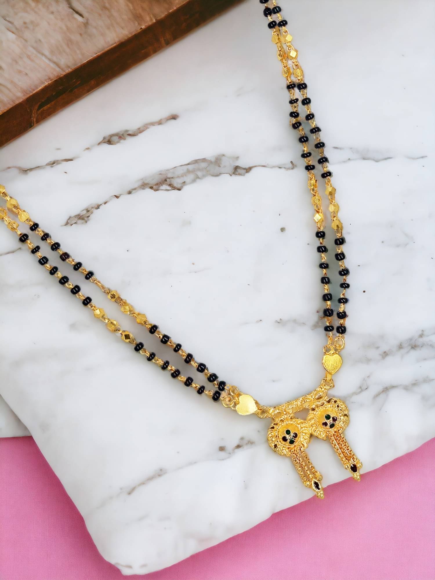 KRIMO Golden Mangalsutra ( Pack of 1 )     			KRIMO Golden Mangalsutra ( Pack of 1 )