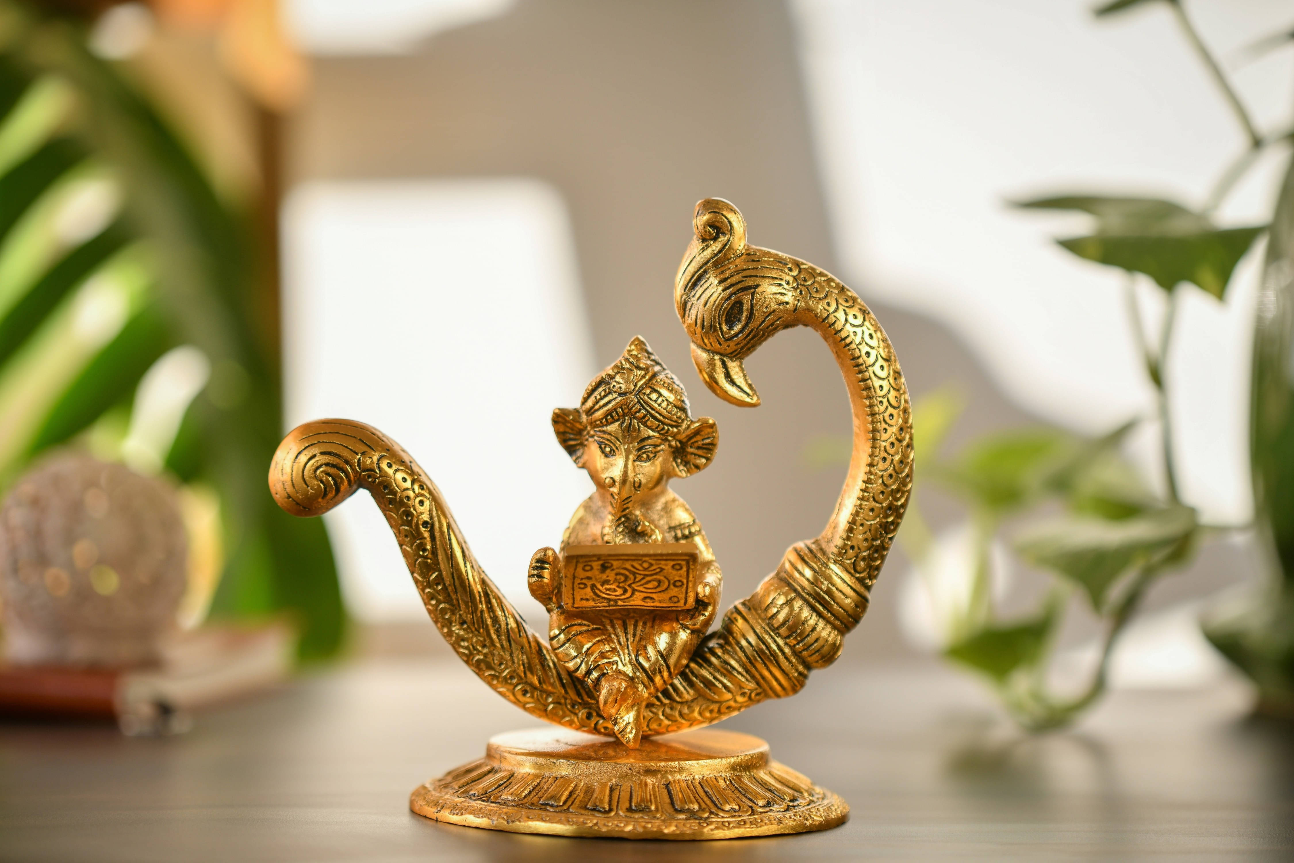 Fashion Bizz Laptop Ganesha Sitting On Peacock Decorative Showpiece - 15 cm Fashion Bizz Laptop Ganesha Sitting On Peacock Decorative Showpiece - 15 cm