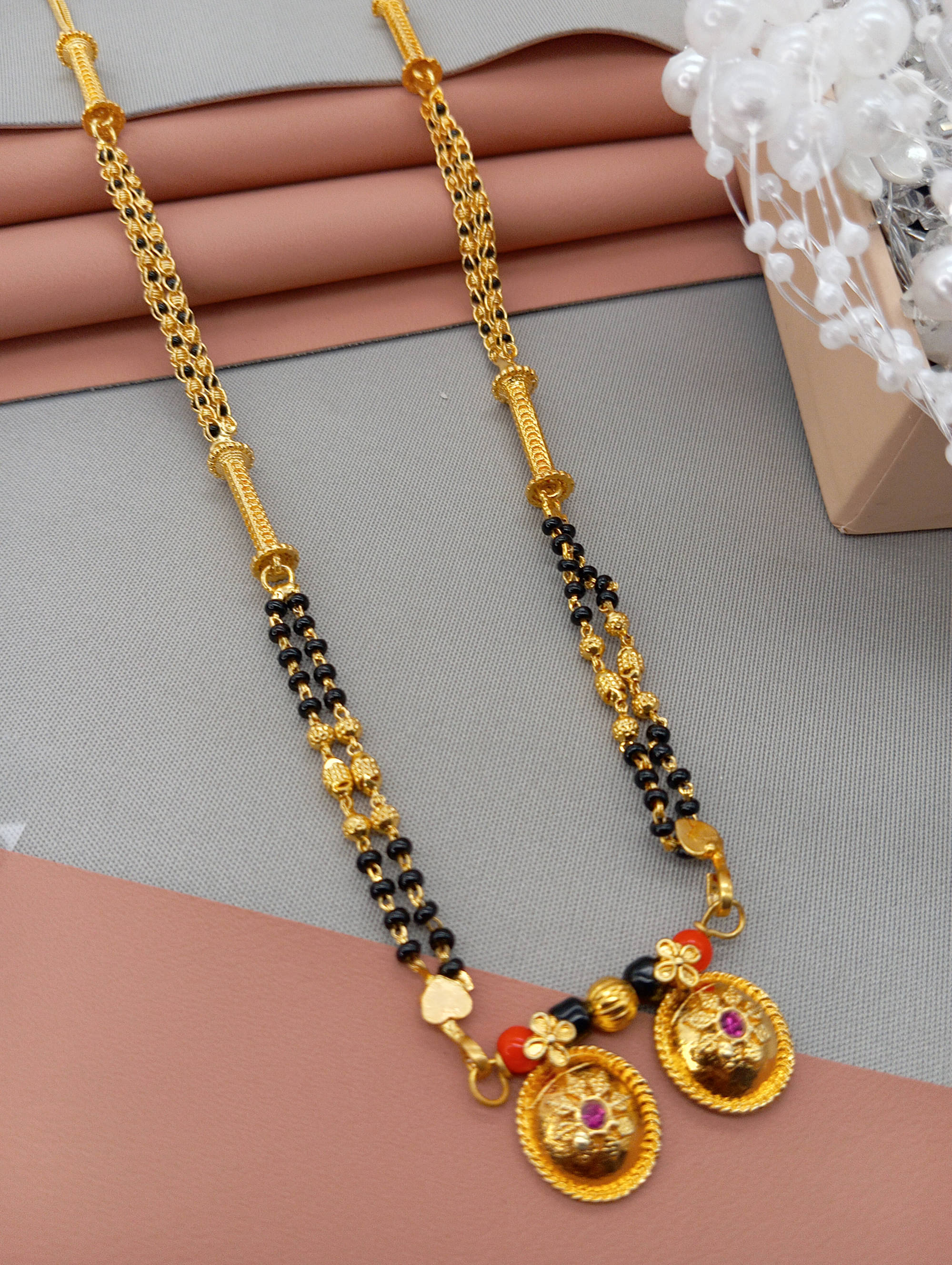     			SHANKHRAJ MA LL Golden Mangalsutra ( Pack of 1 )