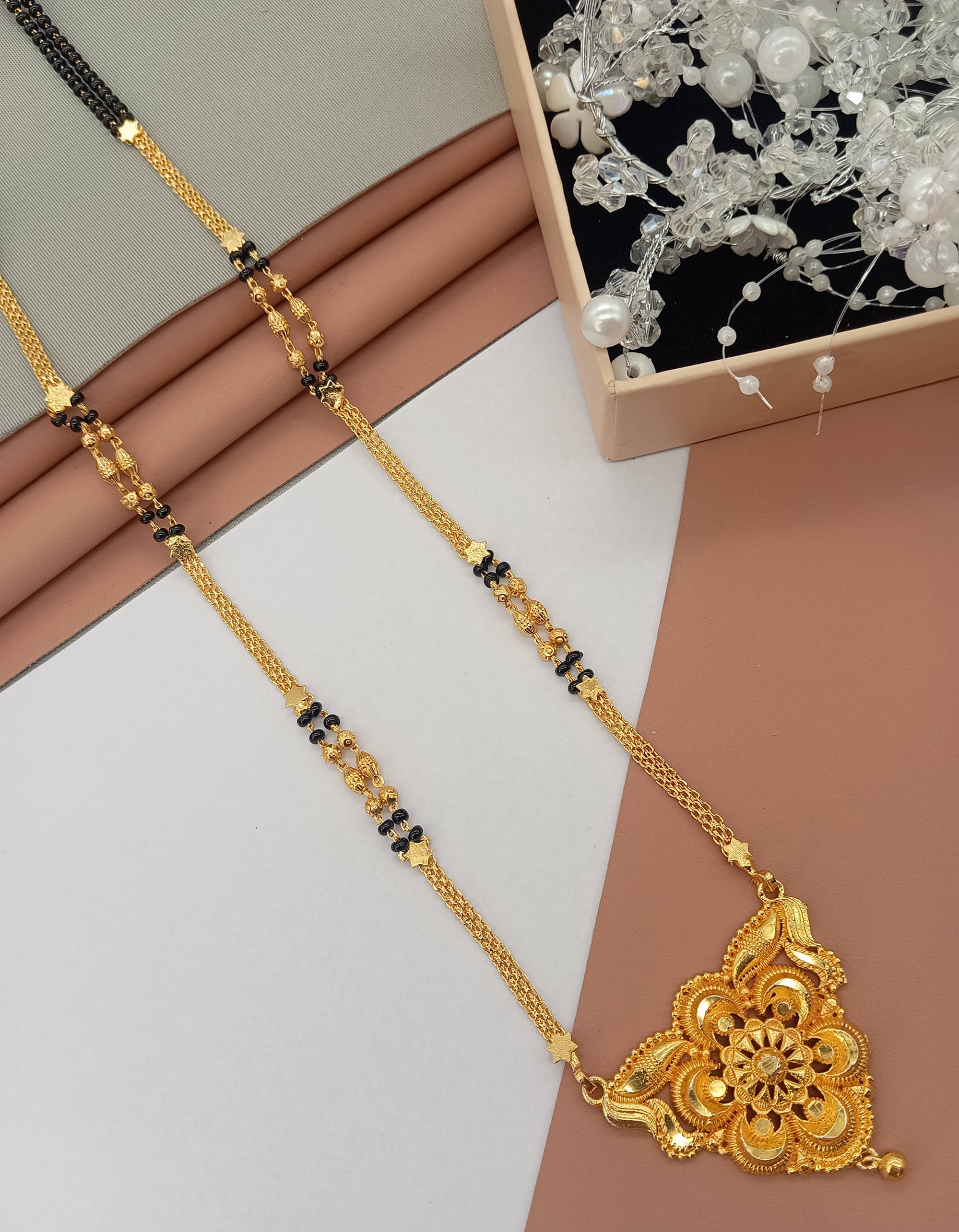 SHANKHRAJ MA LL Golden Mangalsutra ( Pack of 1 ) SHANKHRAJ MA LL Golden Mangalsutra ( Pack of 1 )
