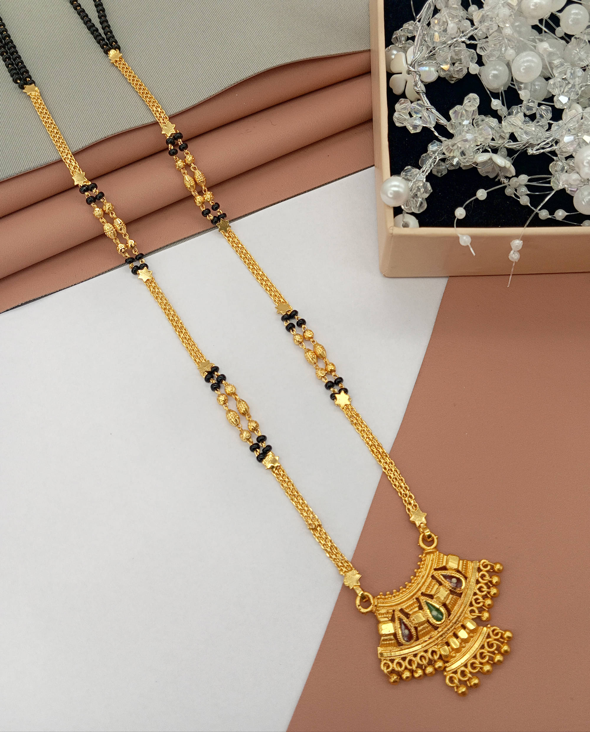     			SHANKHRAJ MA LL Golden Mangalsutra ( Pack of 1 )