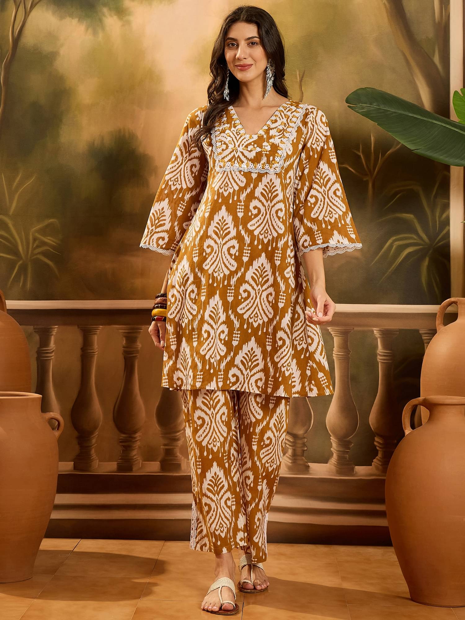    			Stylum Women Cotton Printed A-line Kurti With Pants ( Mustard )