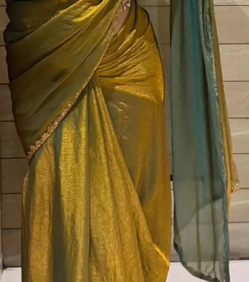 Zumizo Zimmy Choo Self Design Saree With Unstitched Blouse Piece ( Gold ) Zumizo Zimmy Choo Self Design Saree With Unstitched Blouse Piece ( Gold )