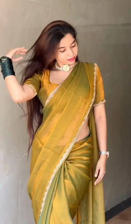 Zumizo Zimmy Choo Self Design Saree With Unstitched Blouse Piece ( Gold ) Zumizo Zimmy Choo Self Design Saree With Unstitched Blouse Piece ( Gold )