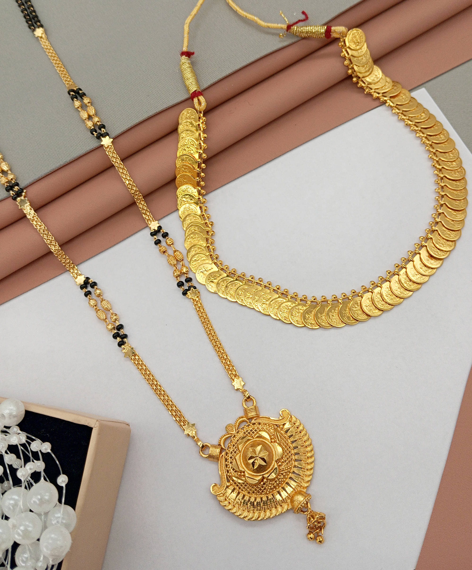 SHANKH-KRIVA Golden Mangalsutra ( Pack of 2 ) SHANKH-KRIVA Golden Mangalsutra ( Pack of 2 )