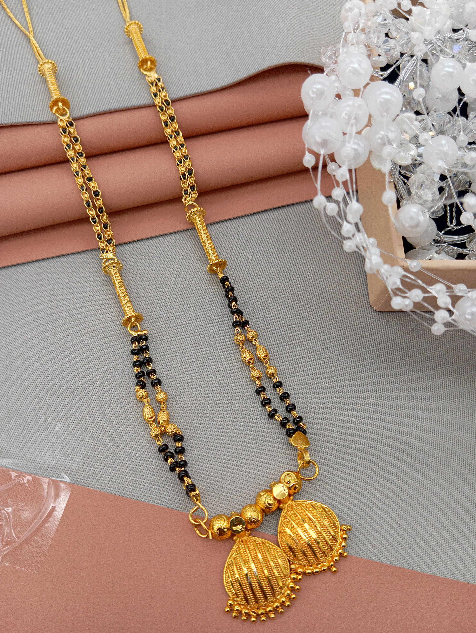     			SHANKH-KRIVA Golden Mangalsutra ( Pack of 1 )