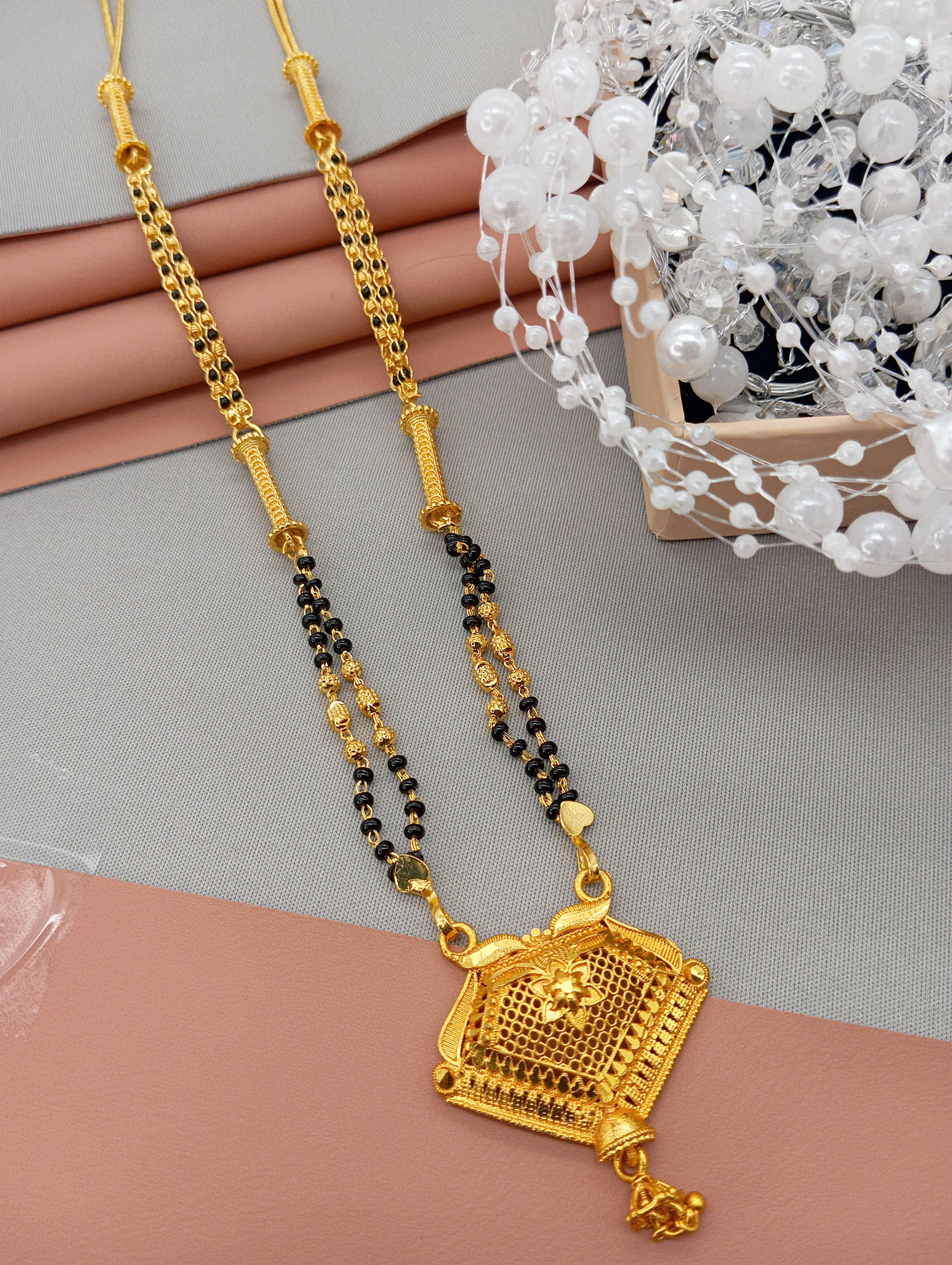 SHANKH-KRIVA Golden Mangalsutra ( Pack of 1 ) SHANKH-KRIVA Golden Mangalsutra ( Pack of 1 )