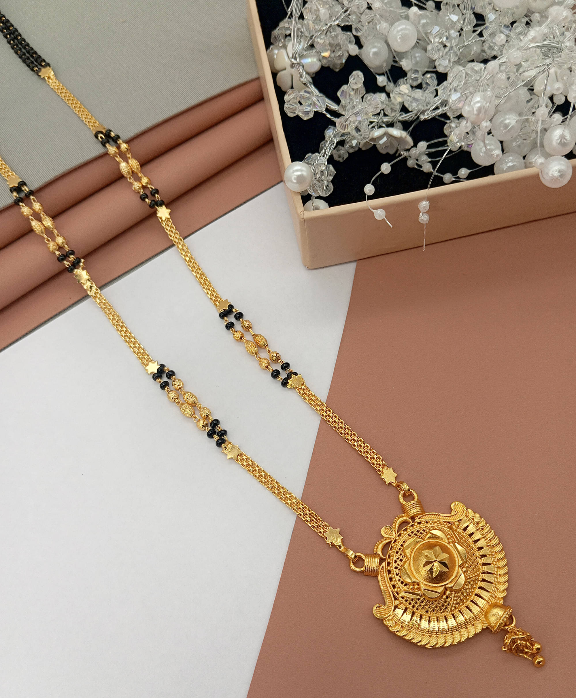 SHANKH-KRIVA Golden Mangalsutra ( Pack of 1 ) SHANKH-KRIVA Golden Mangalsutra ( Pack of 1 )