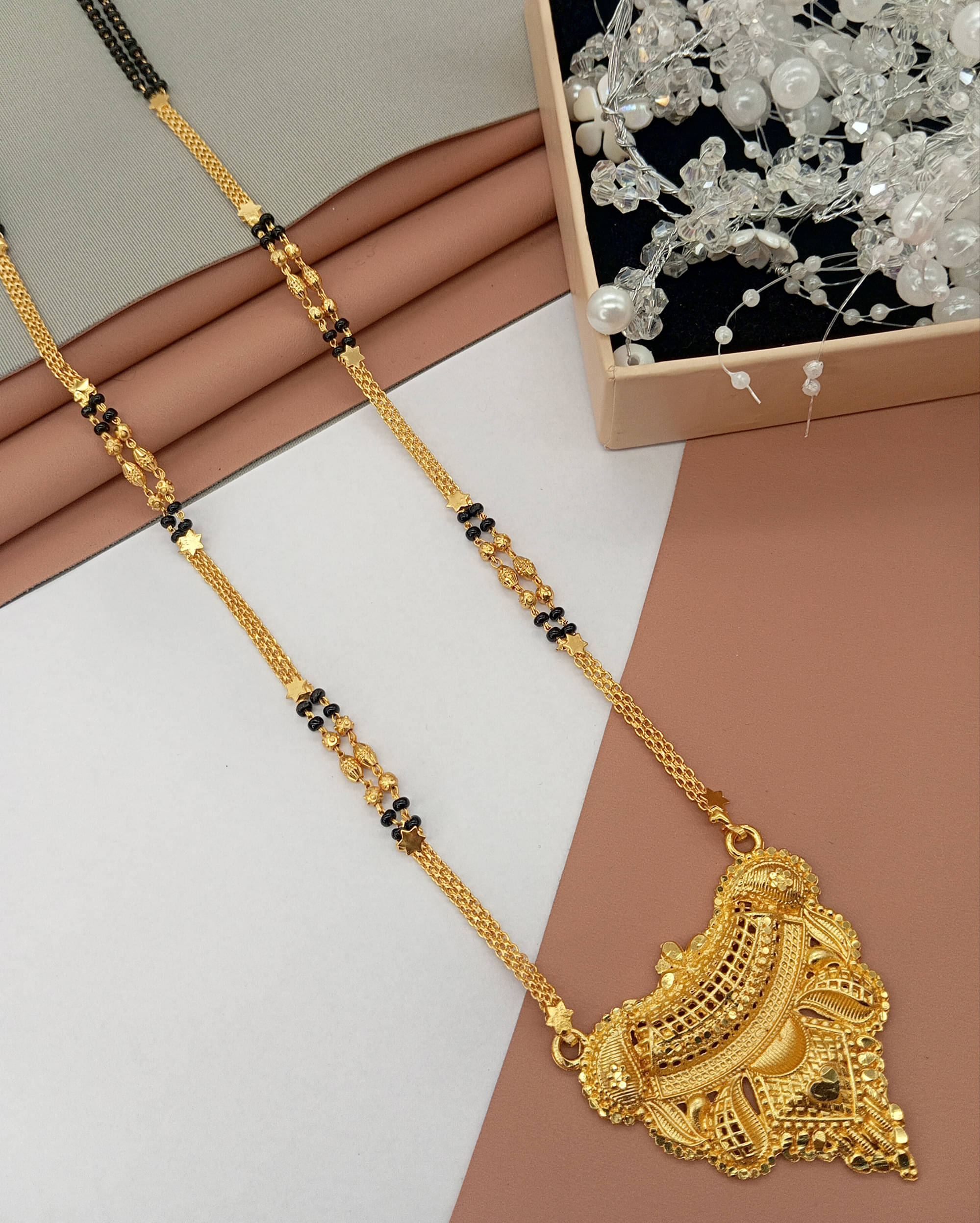     			SHANKH-KRIVA Golden Mangalsutra ( Pack of 1 )