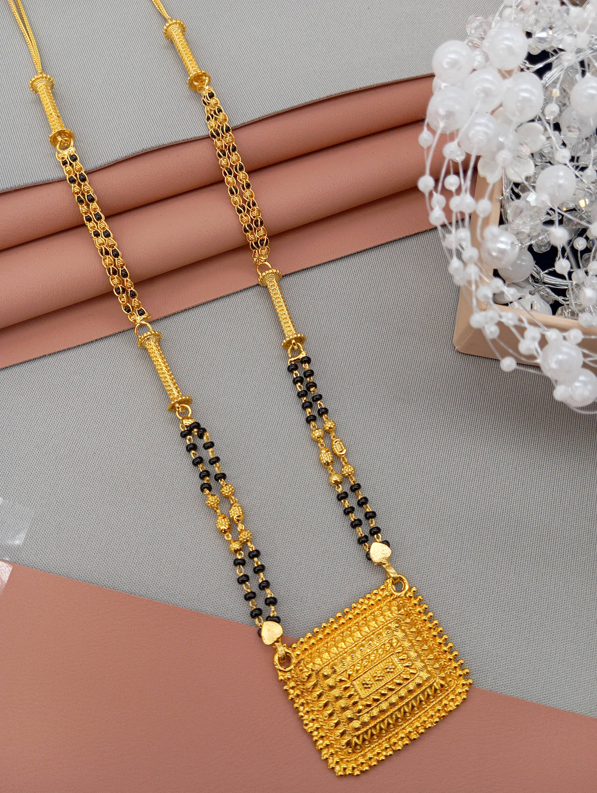 SHANKH-KRIVA Golden Mangalsutra ( Pack of 1 ) SHANKH-KRIVA Golden Mangalsutra ( Pack of 1 )