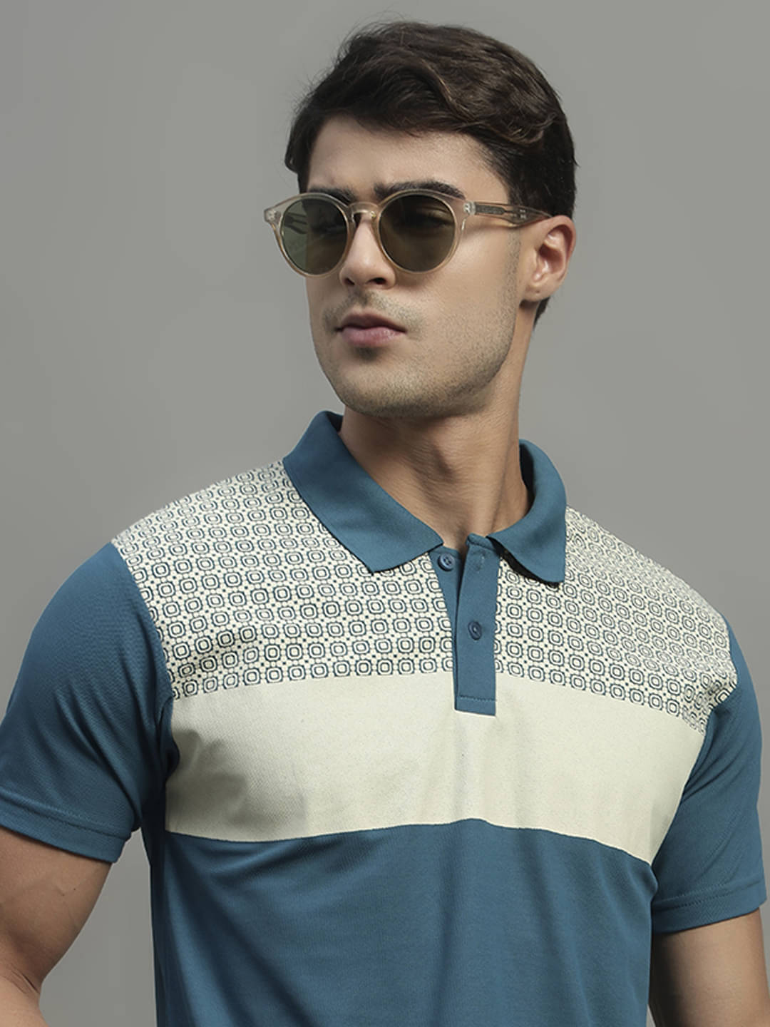     			THE CASUALS Men Cotton Blend Regular Fit Printed Polo T Shirt ( Blue )