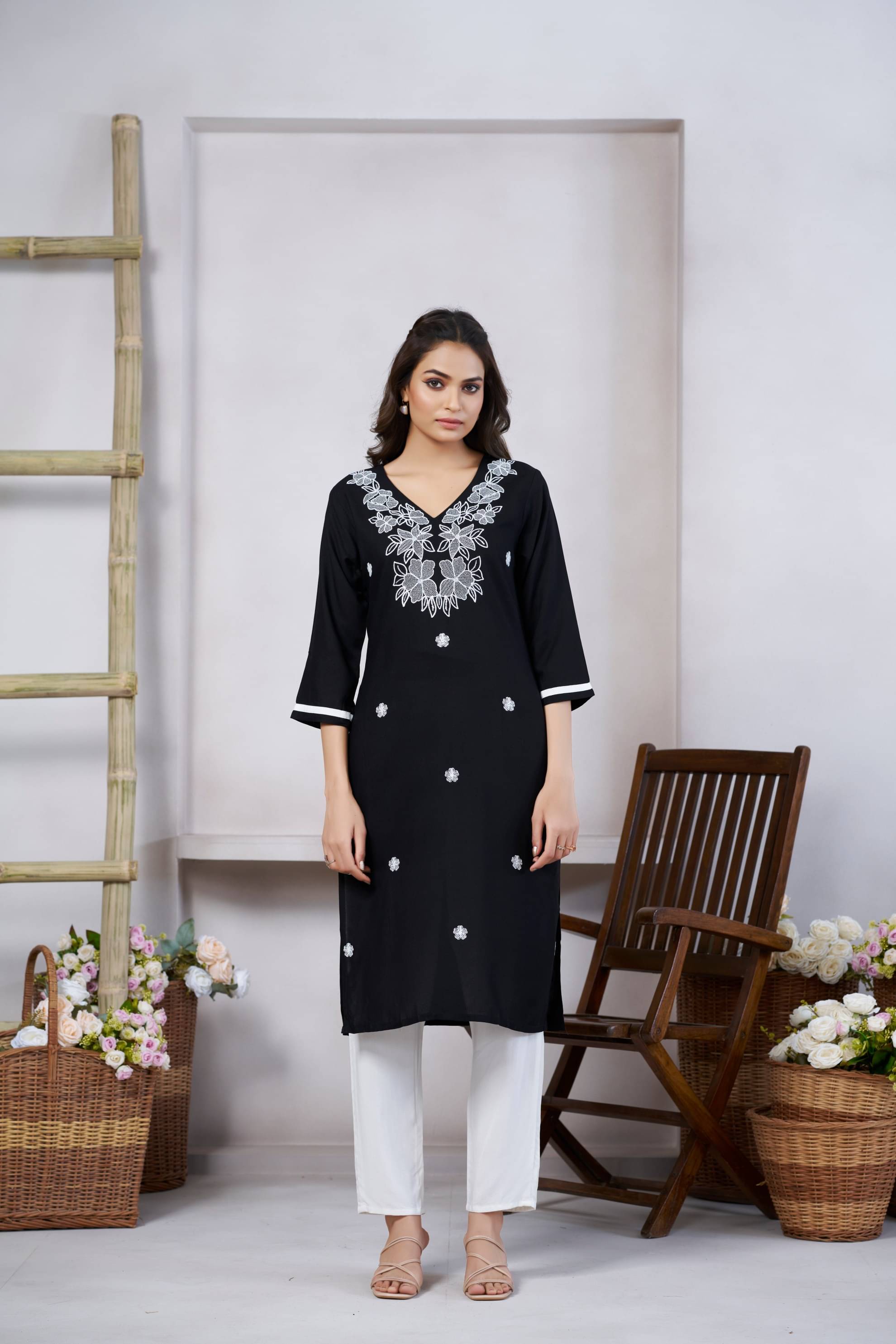     			CYNOR Women Viscose Rayon Self Design Straight Kurti ( Black )
