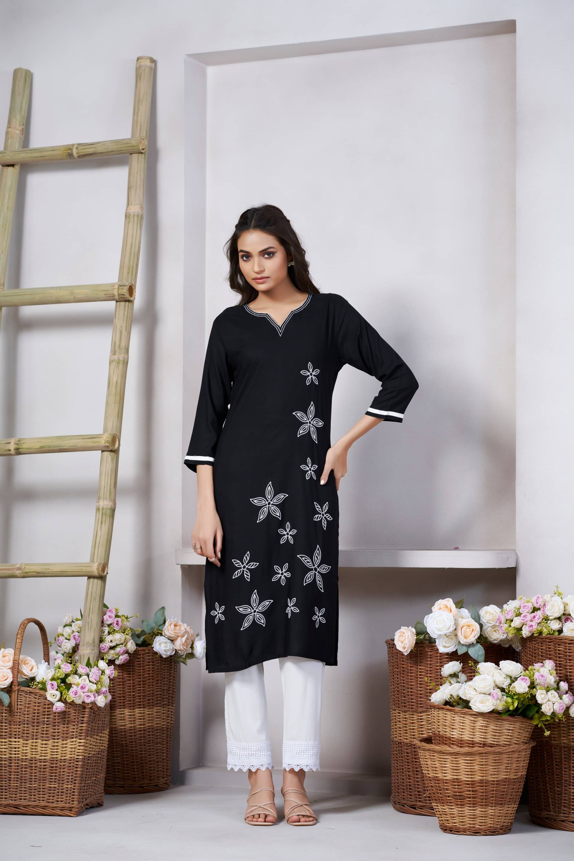 CYNOR Women Viscose Rayon Embroidered Straight Kurti ( Black ) CYNOR Women Viscose Rayon Embroidered Straight Kurti ( Black )