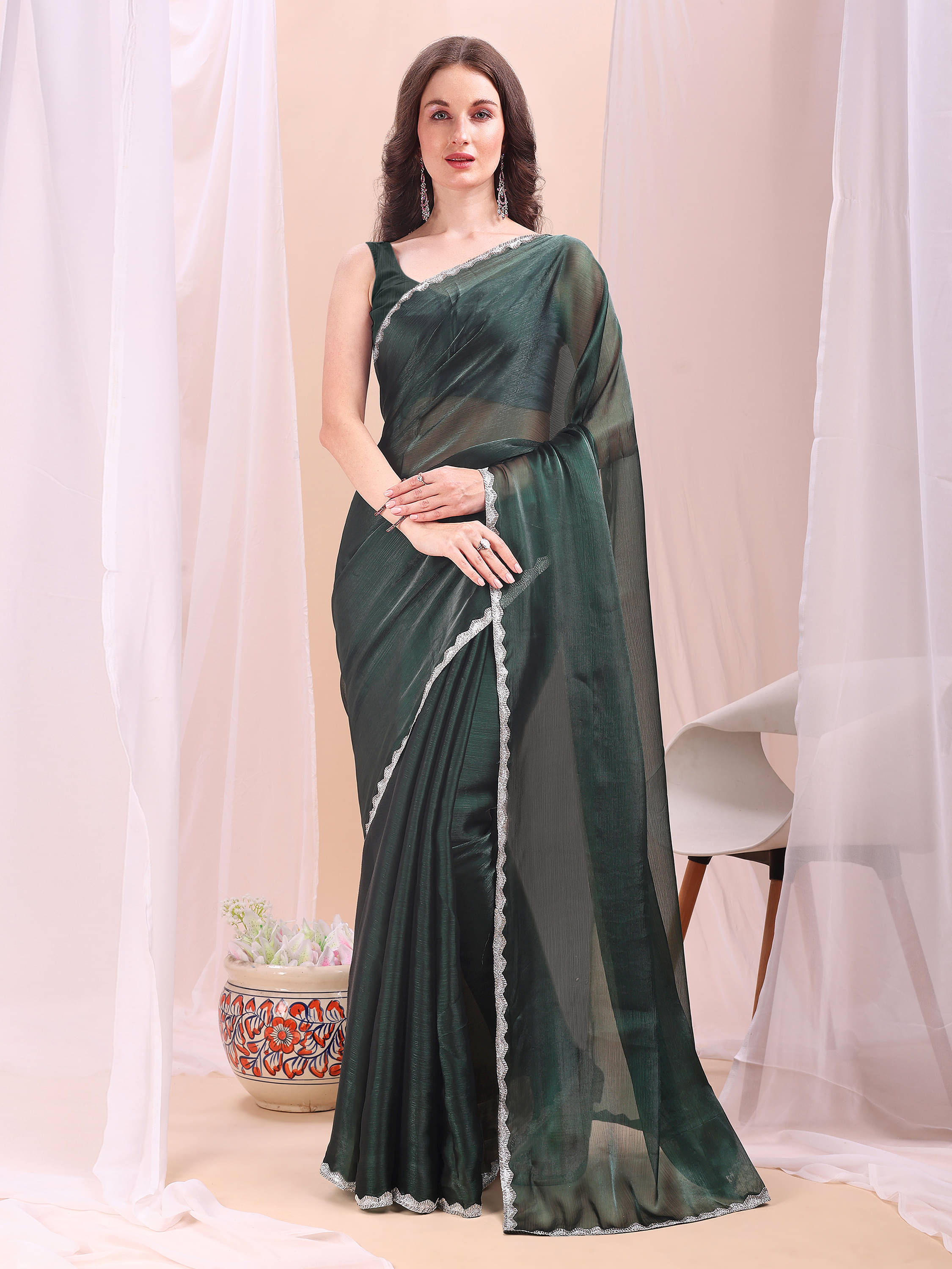 XOOM LADY Zimmy Choo Solid Saree With Unstitched Blouse Piece ( Green ) XOOM LADY Zimmy Choo Solid Saree With Unstitched Blouse Piece ( Green )
