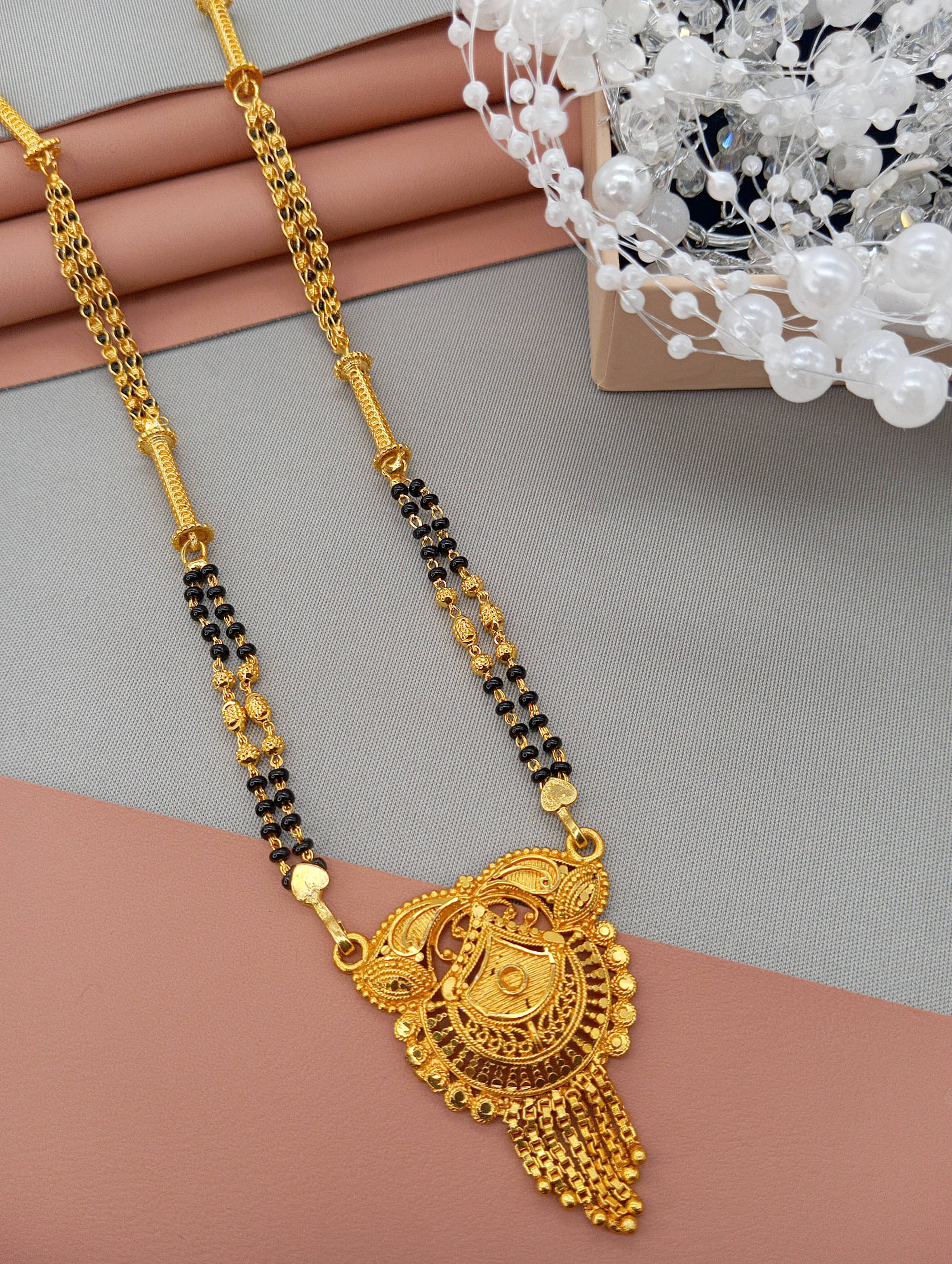     			SHANKHRAJ MA LL Golden Mangalsutra ( Pack of 1 )