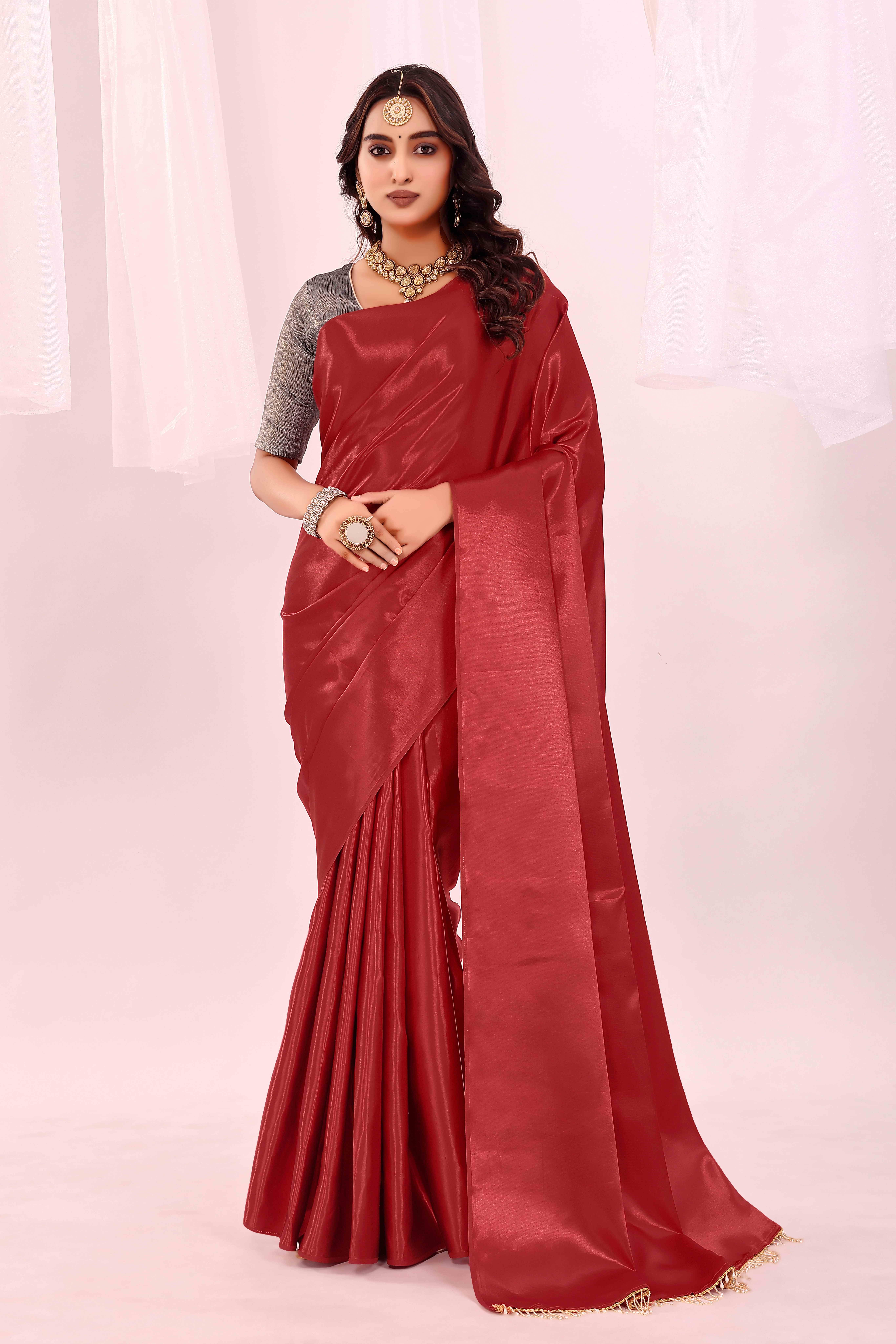 Saadhvi Satin Solid Saree With Unstitched Blouse Piece ( Maroon ) Saadhvi Satin Solid Saree With Unstitched Blouse Piece ( Maroon )