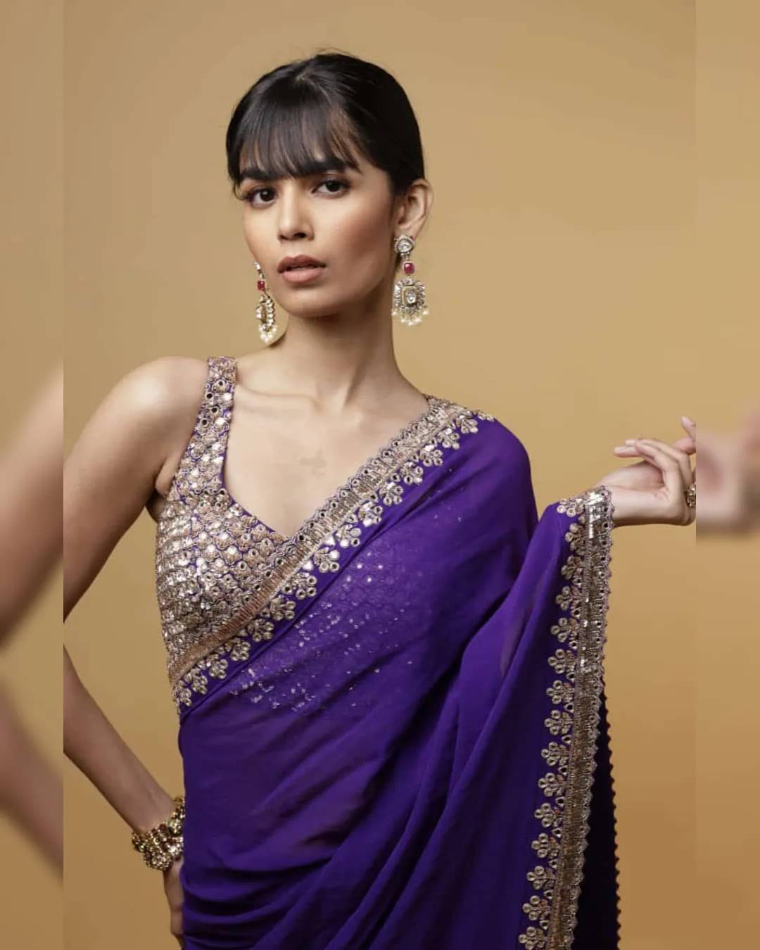 Suali Georgette Embellished Saree With Unstitched Blouse Piece ( Purple ) Suali Georgette Embellished Saree With Unstitched Blouse Piece ( Purple )