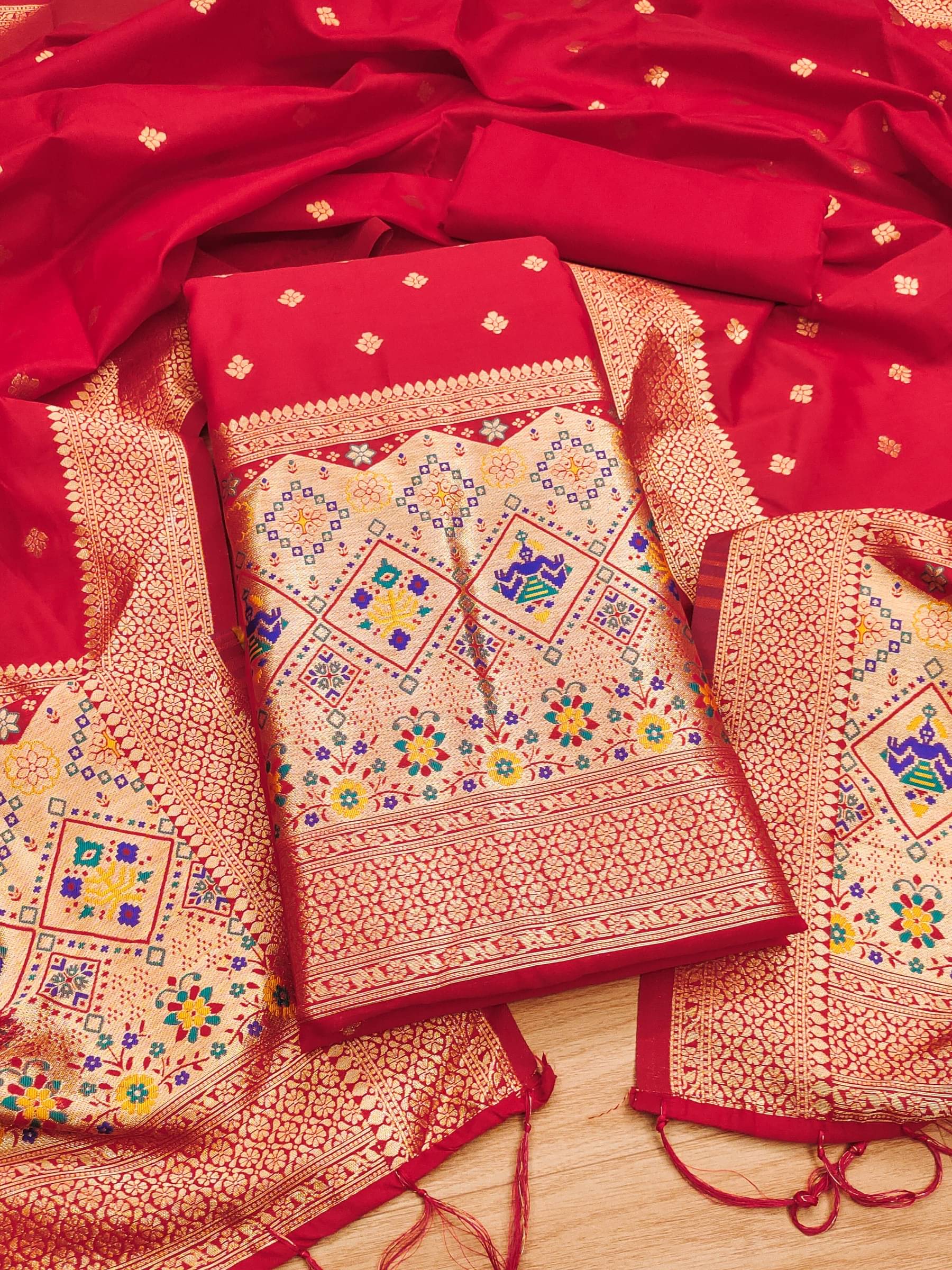 Rangtulika Ethnics Women Banarasi Unstitched Dress Material ( Red ) Rangtulika Ethnics Women Banarasi Unstitched Dress Material ( Red )