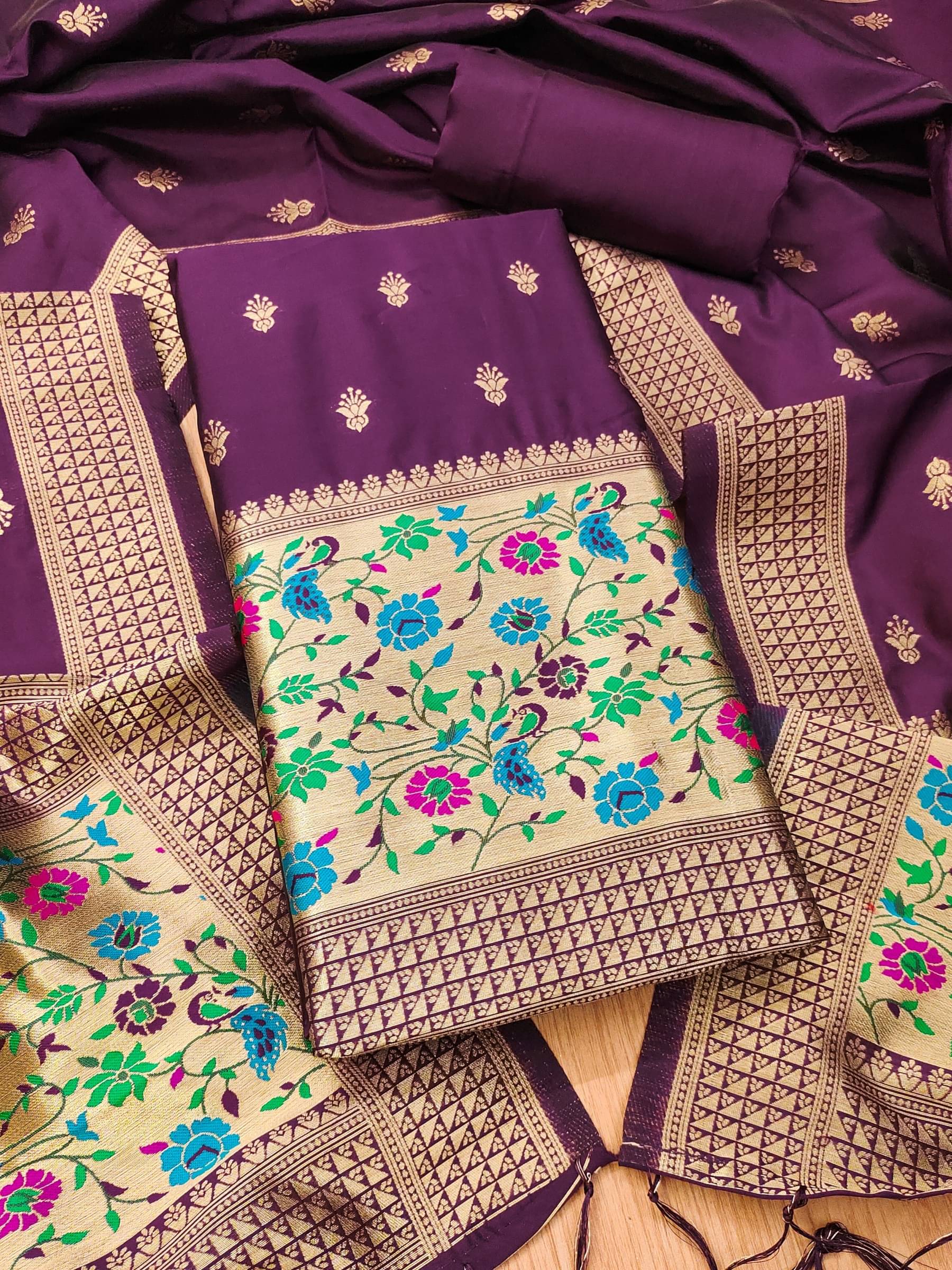 Rangtulika Ethnics Women Banarasi Unstitched Dress Material ( Wine )     			Rangtulika Ethnics Women Banarasi Unstitched Dress Material ( Wine )