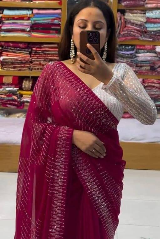Crissy Georgette Embellished Banarasi saree With Unstitched Blouse Piece ( Rani ) Crissy Georgette Embellished Banarasi saree With Unstitched Blouse Piece ( Rani )