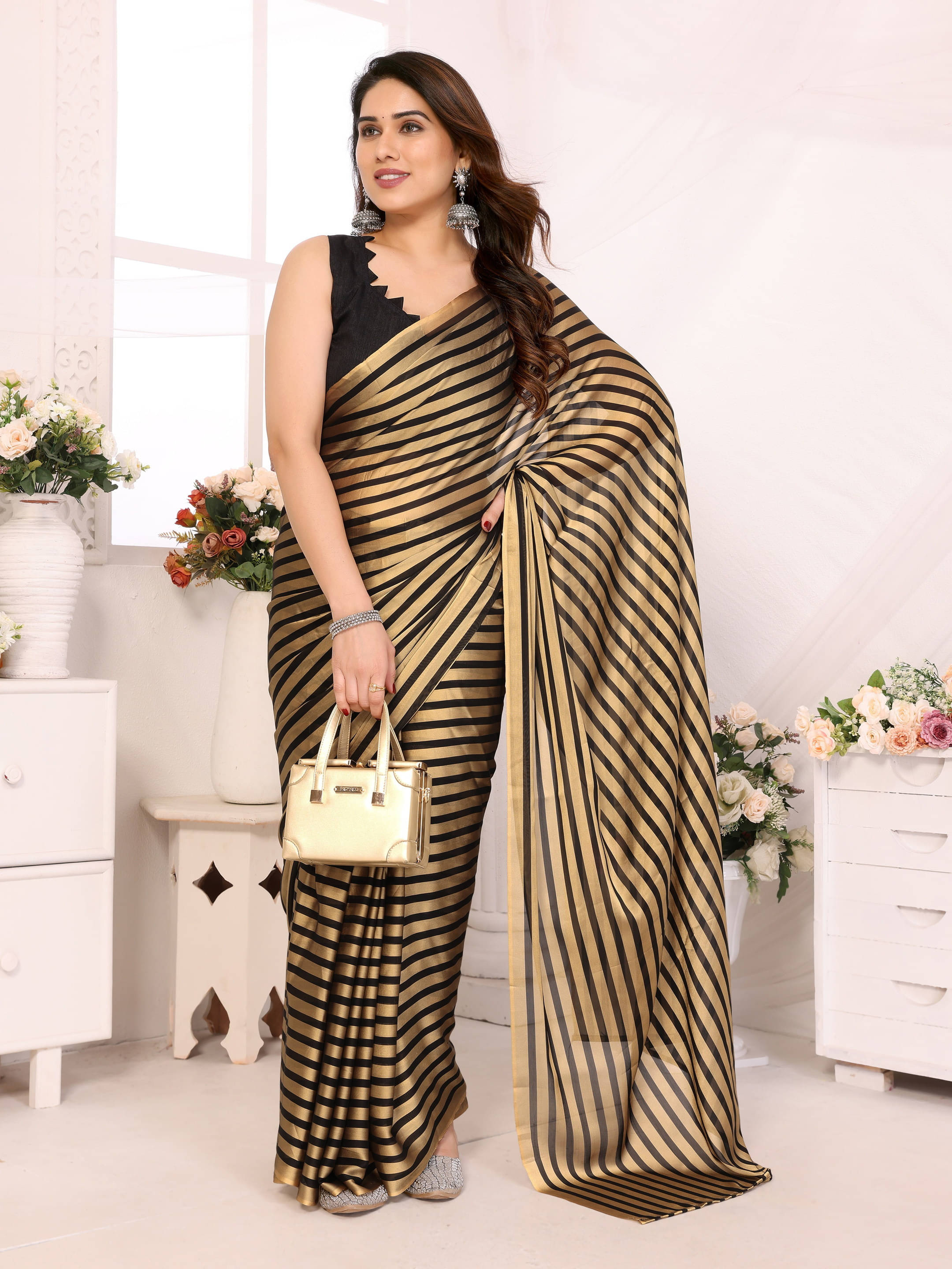     			Sadika Georgette Striped Saree With Unstitched Blouse Piece ( Black )