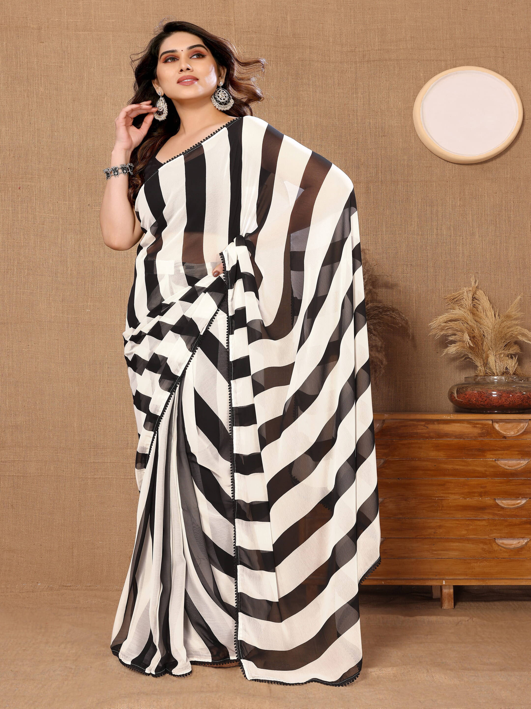Sadika Georgette Striped Saree With Unstitched Blouse Piece ( Black ) Sadika Georgette Striped Saree With Unstitched Blouse Piece ( Black )