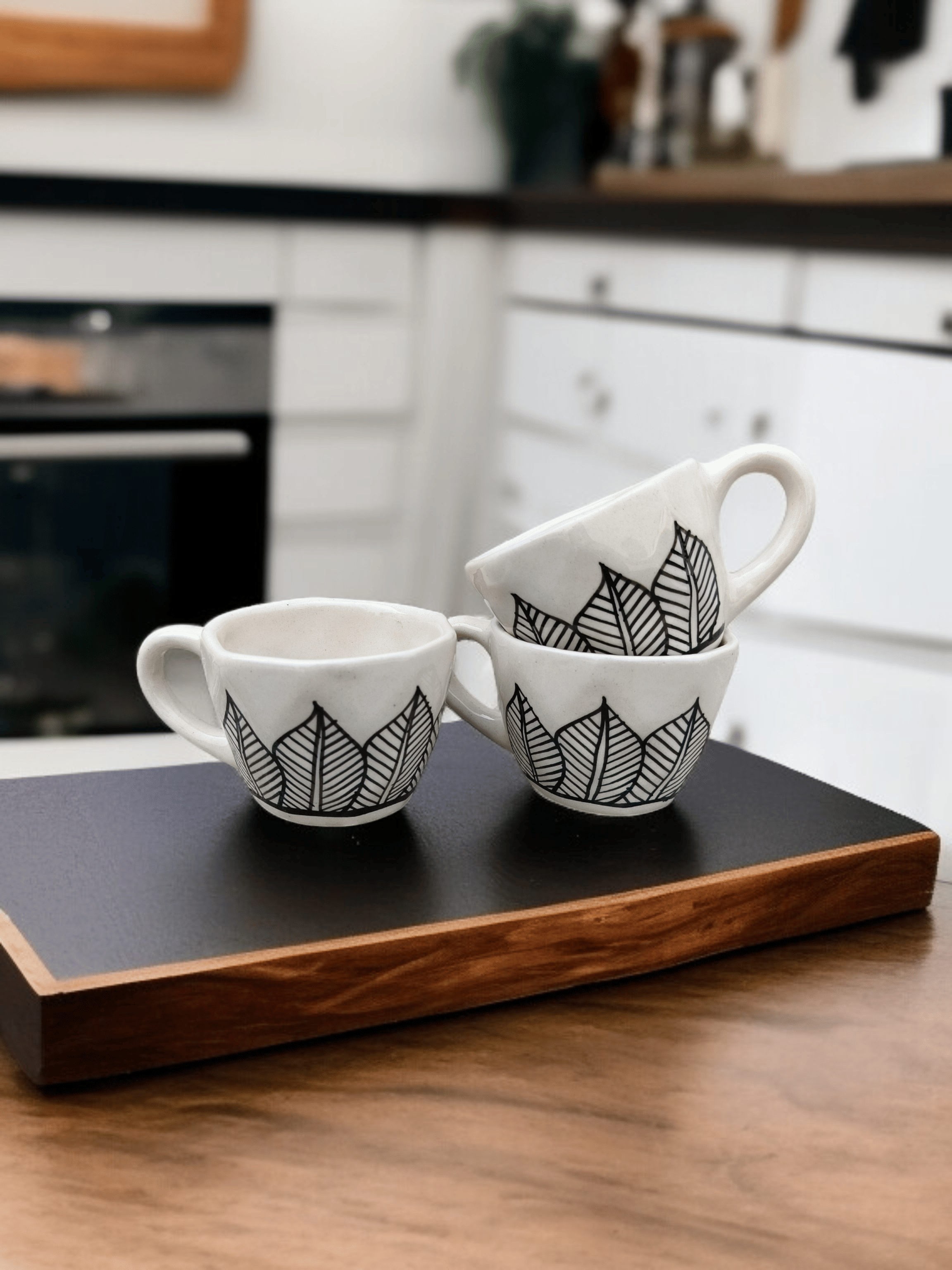 Malaikah Blk Leaf Cup Pk 3 Abstract Ceramic Coffee Mug 200 mL ( Pack of 3 )     			Malaikah Blk Leaf Cup Pk 3 Abstract Ceramic Coffee Mug 200 mL ( Pack of 3 )